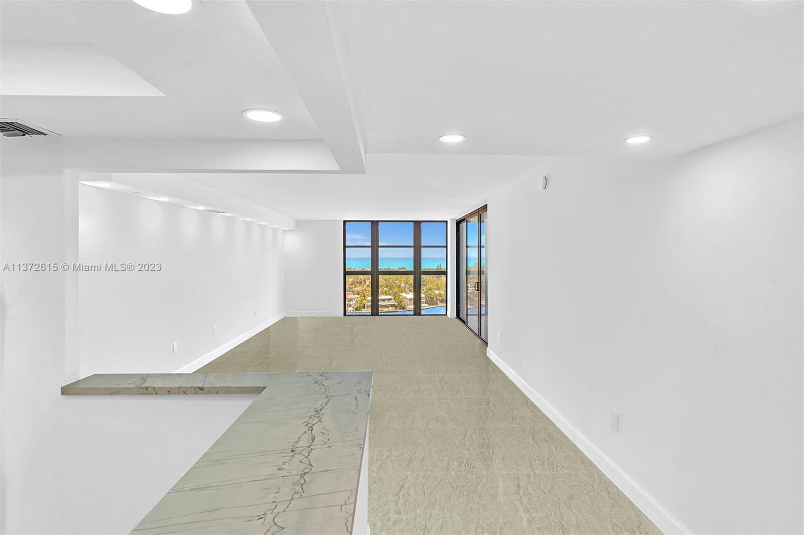 Beautifully Remodeled, Open Kitchen with Quartz countertops.