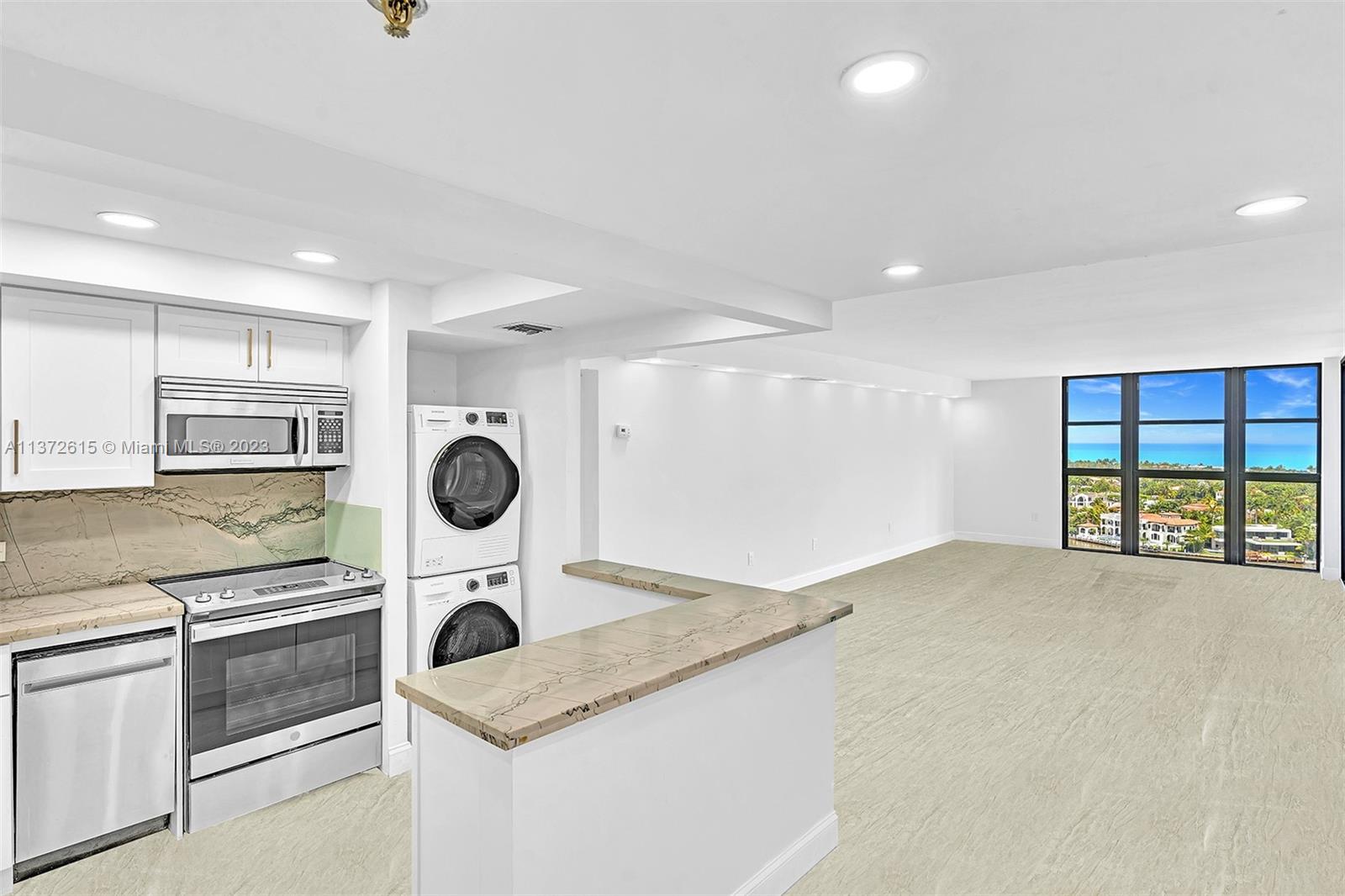 Beautifully Remodeled, Open Kitchen with Quartz countertops.