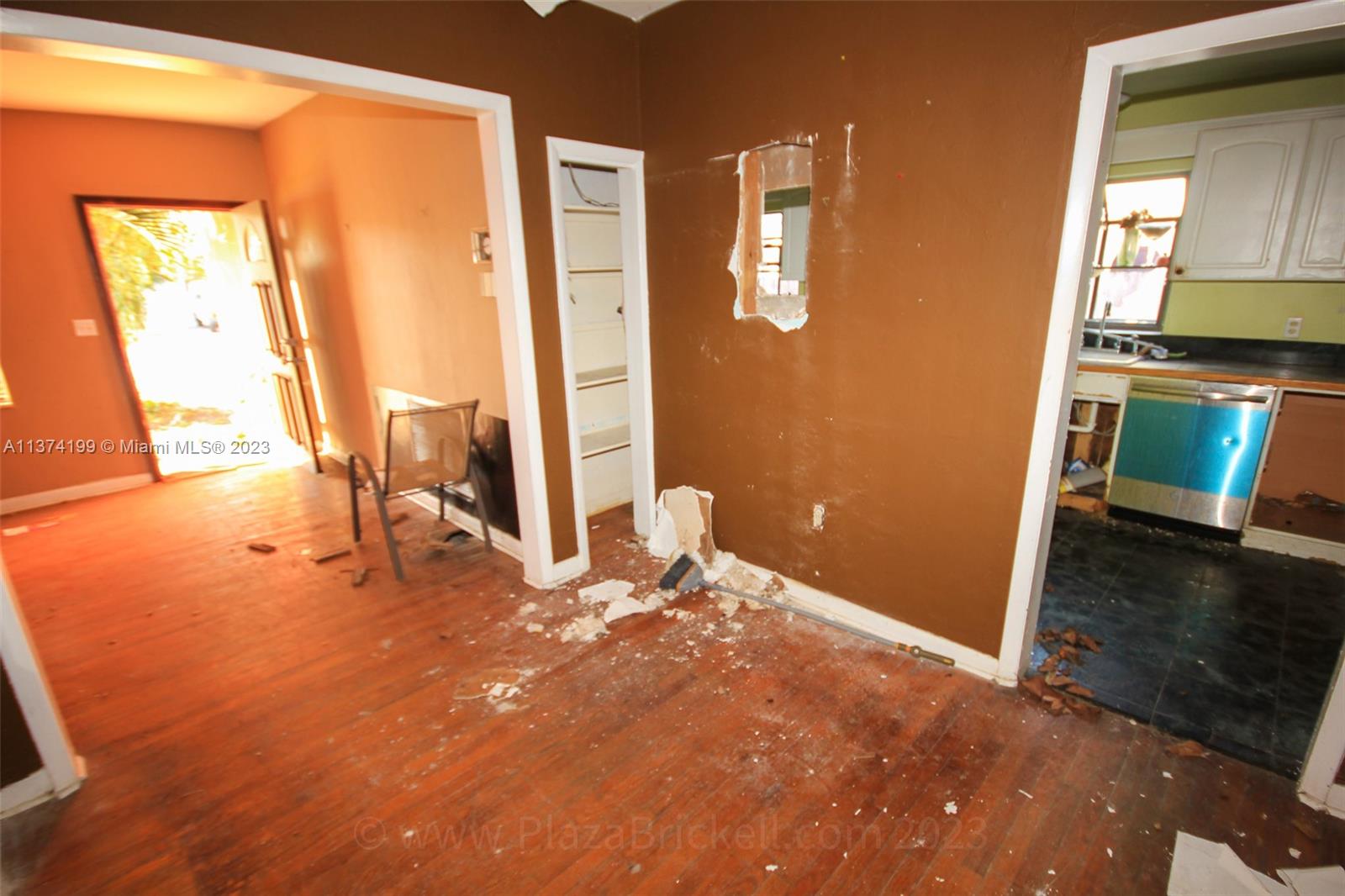 This wall will be demolished to open the kitchen to the large living room