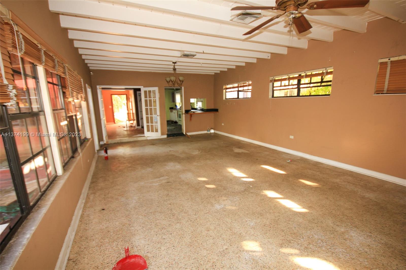 This large addtion will be converted to the Master Bedroom, a Master Bathroom, and an additional bathroom for visitors and people using the pool. Left windows will be replaced by sliding doors accessing the pool area and patio.