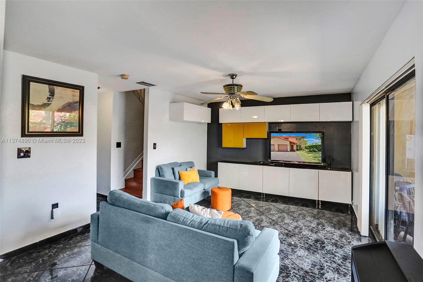 Family room with access to the patio via the sliding glass doors.