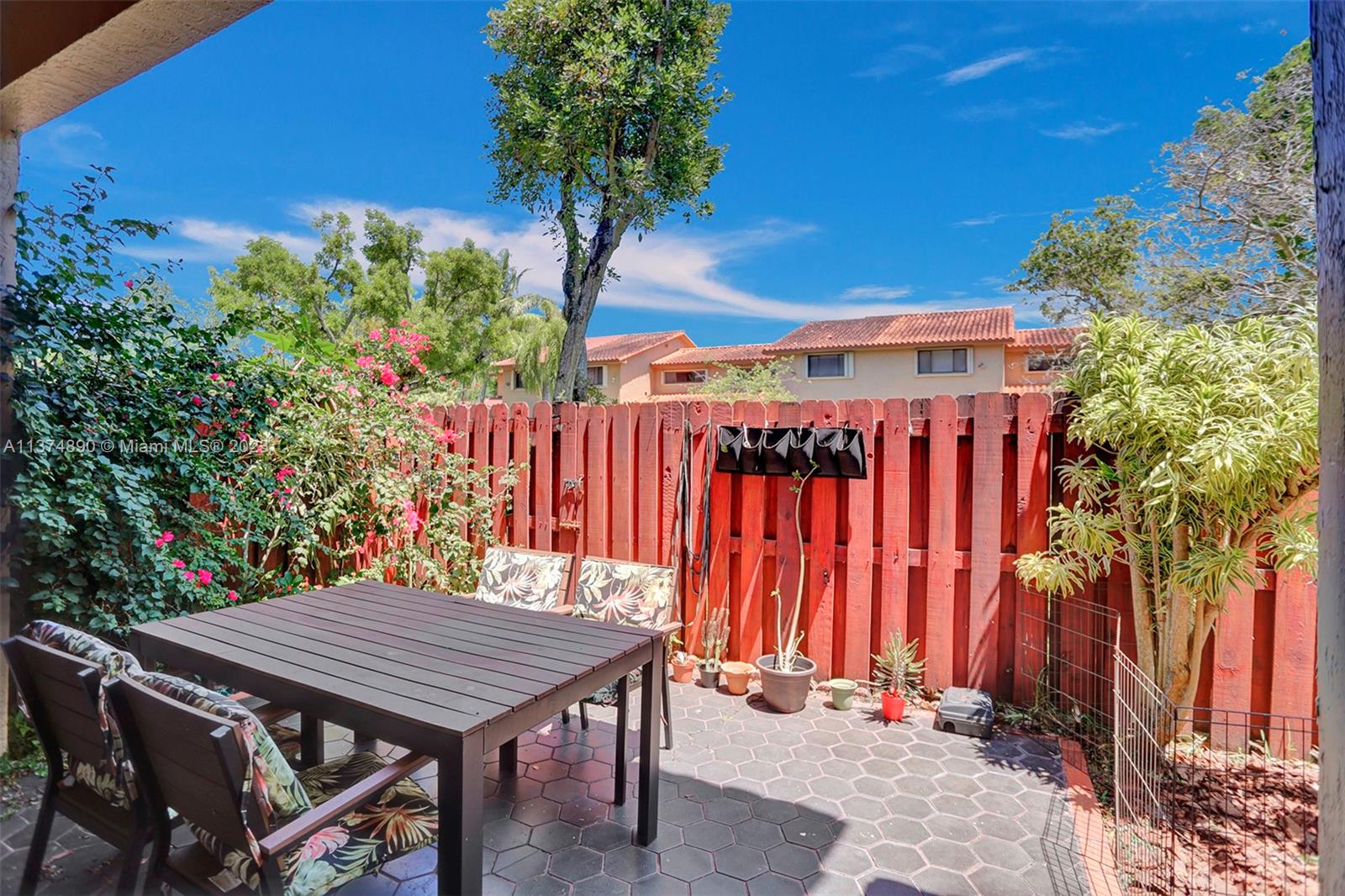 Another view of the backyard patio with access to the greenbelt.