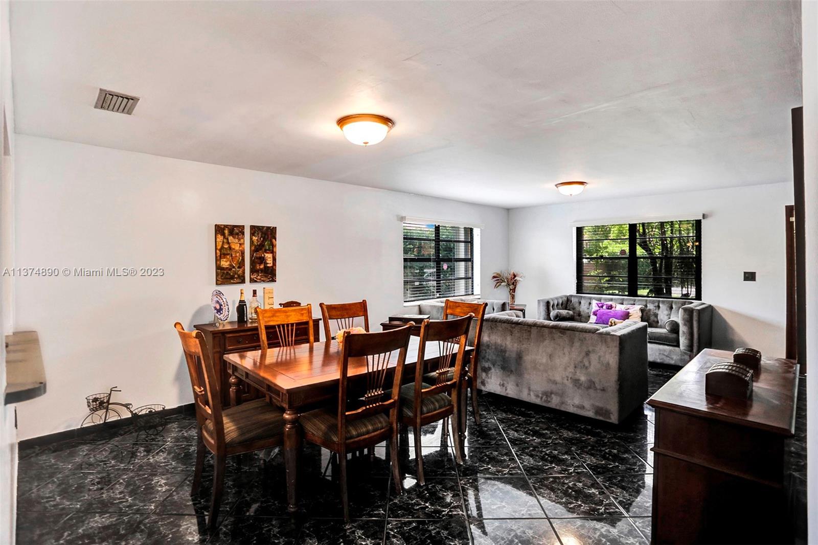 Dining room and living room area which is actually very spacious.