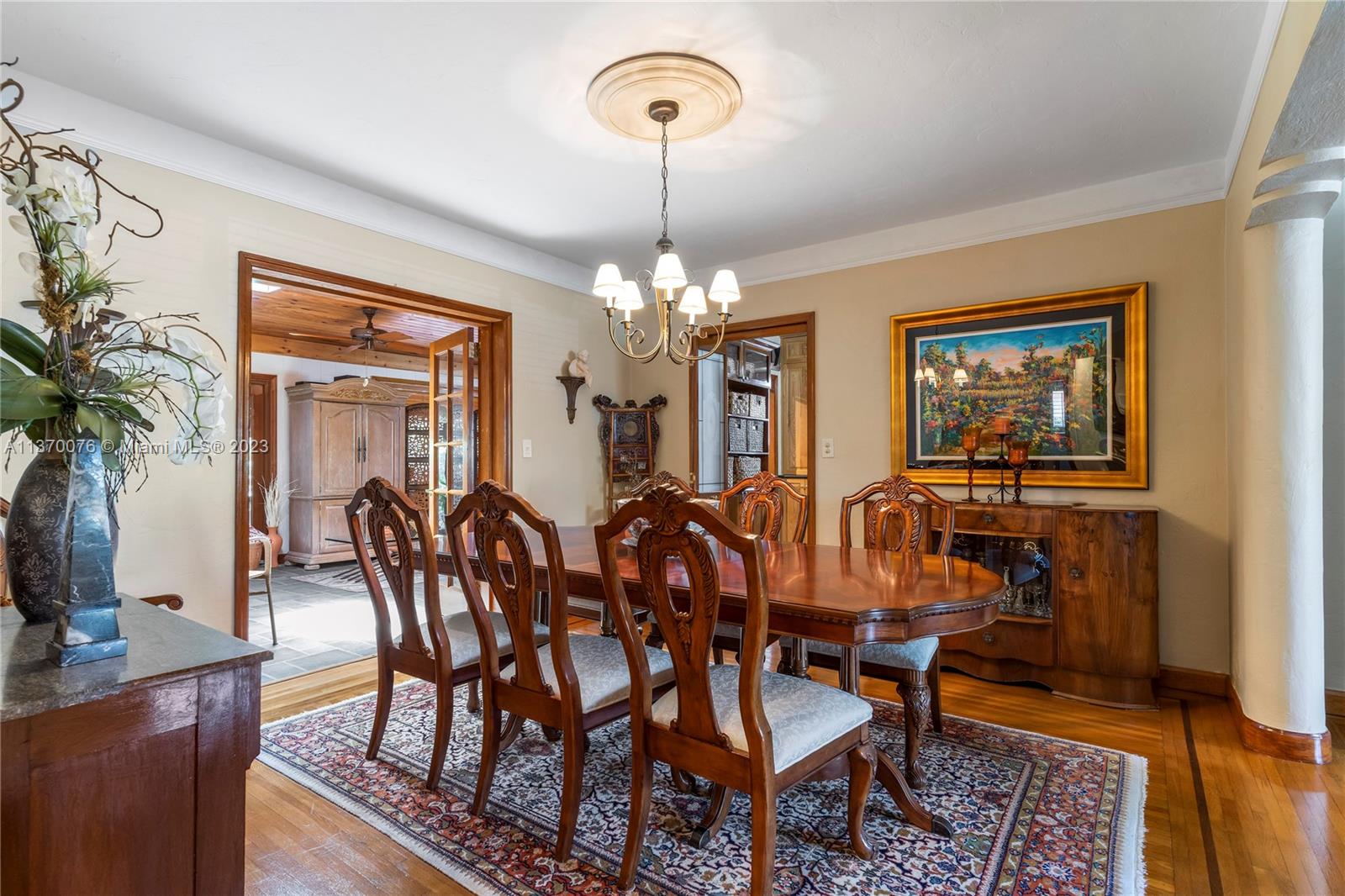 Dining area with Family Room to the left, kitchen entrance in center of picture. Living Room is to the right.