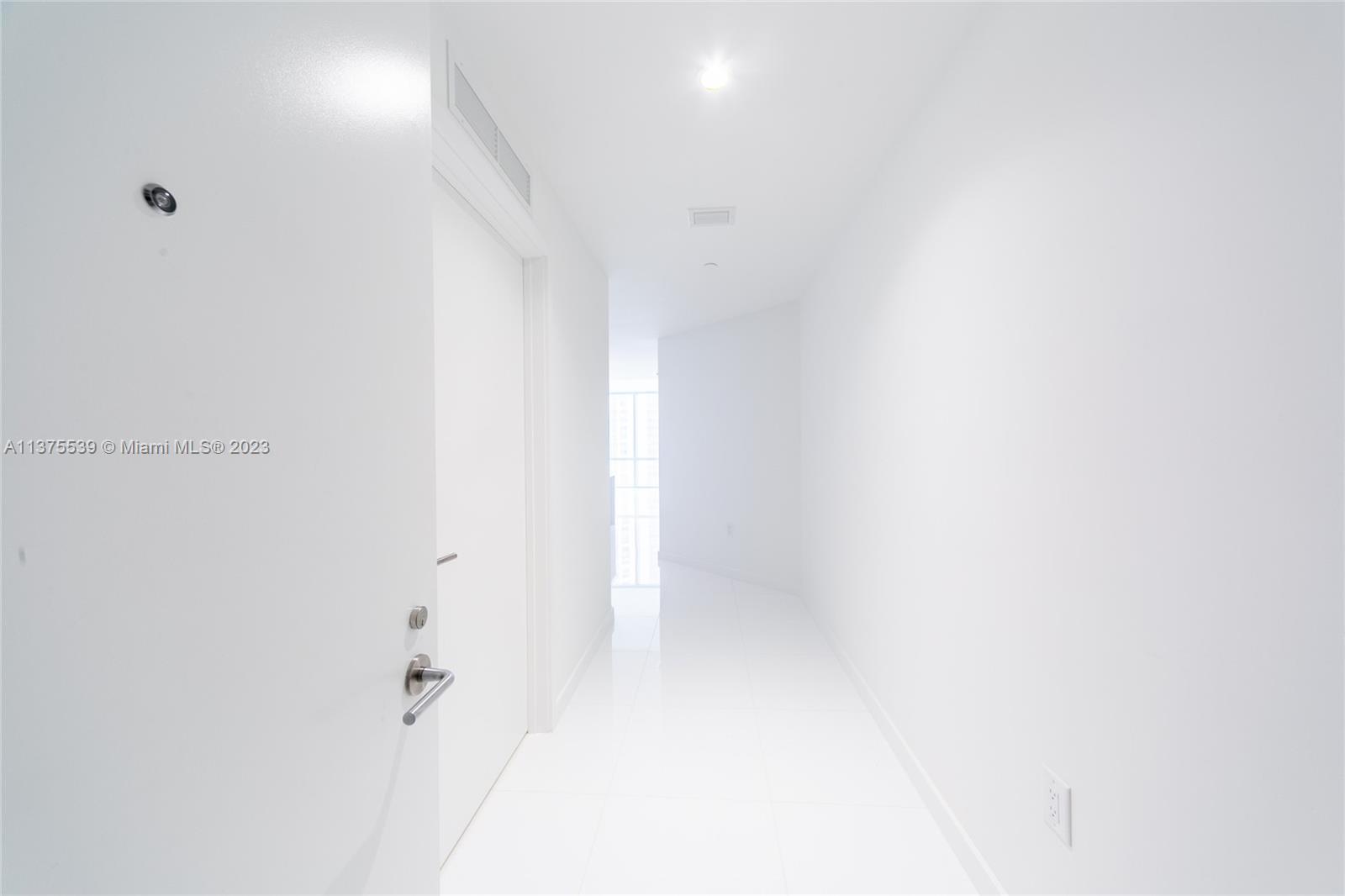 Entrance. Residence 2307 on 23 floor has 2 bedrooms/3 bathrooms + Den