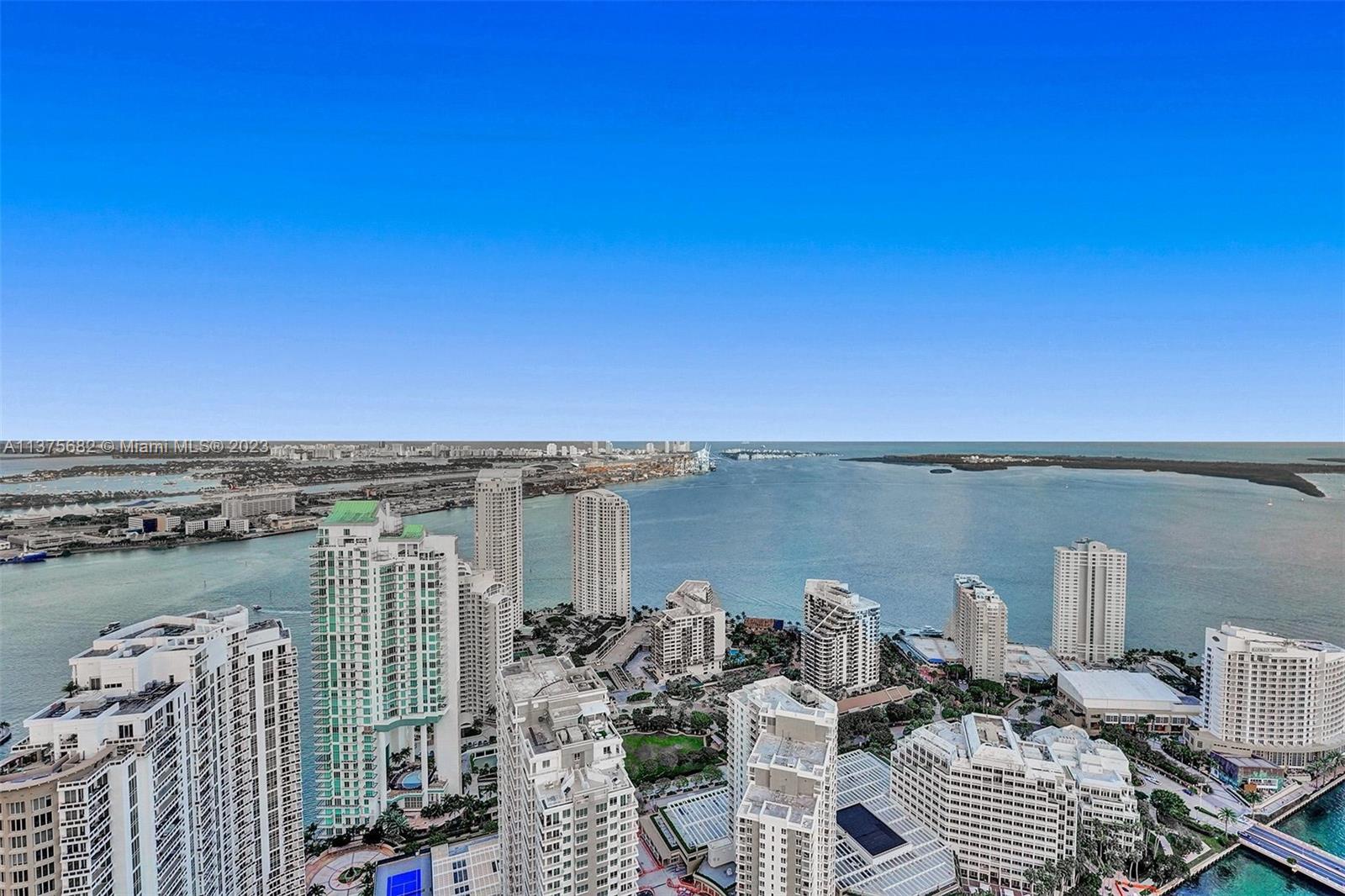 Largest unit in the very popular "Icon Brickell", over 3,600 sq ft including the terrace.  Unit has Spectacular Water Views that will never be taken away in the future, facing Biscayne Bay & the Atlantic Ocean.  Huge unique bonus of a Private, approx. 1,000 sq ft, outdoor terrace.  The terrace is surrounded by 30ft+ high Hurricane Impact Glass which permits you to keep peace of mind during large gatherings or children playing outside unattended.  Unit itself has some upgrades which include Marble floors throughout, lighting upgrades & closet build outs. One of the 4 Bedrooms has been opened up to create a larger living room space, now making the unit 3 Bedroom and a den.  
Icon Brickell is in the heart of the City, but right on the water.  Condo has some of the best amenities around town.