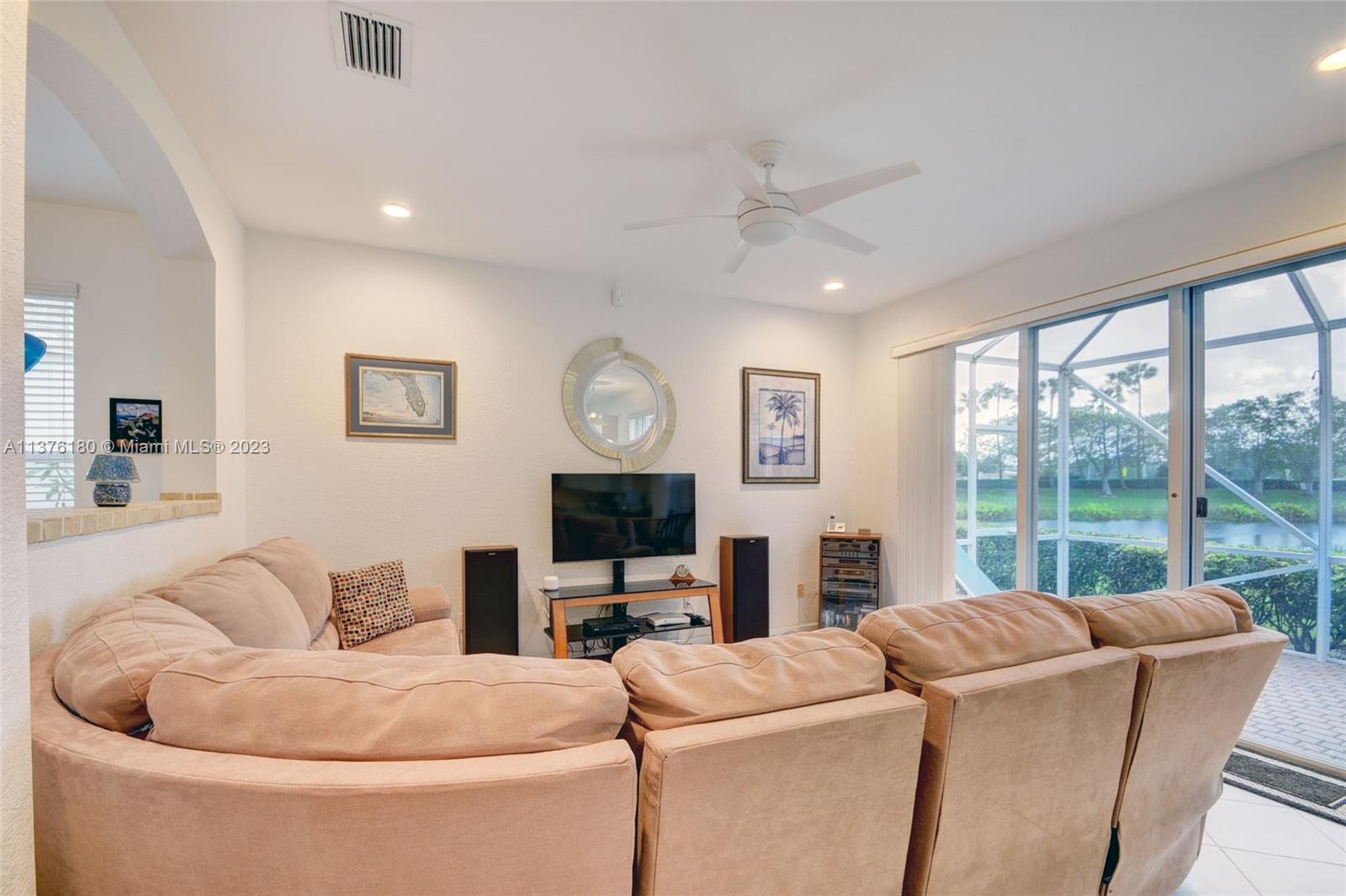 family room overlooking lanai and lake