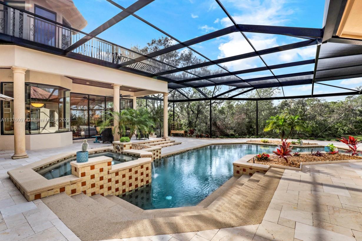 View of Spa and Pool from Outdoor Kitchen