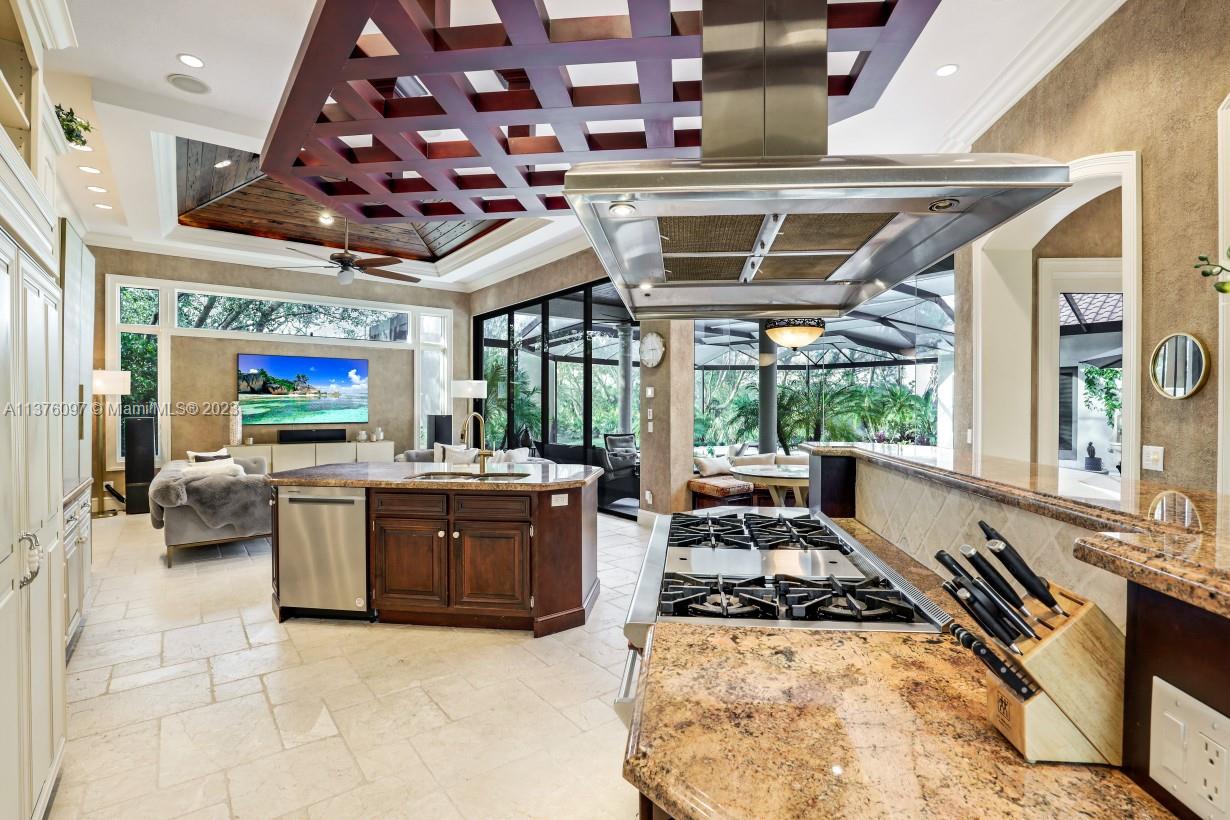 Food prep area next to Wolf 6 burner gas range.