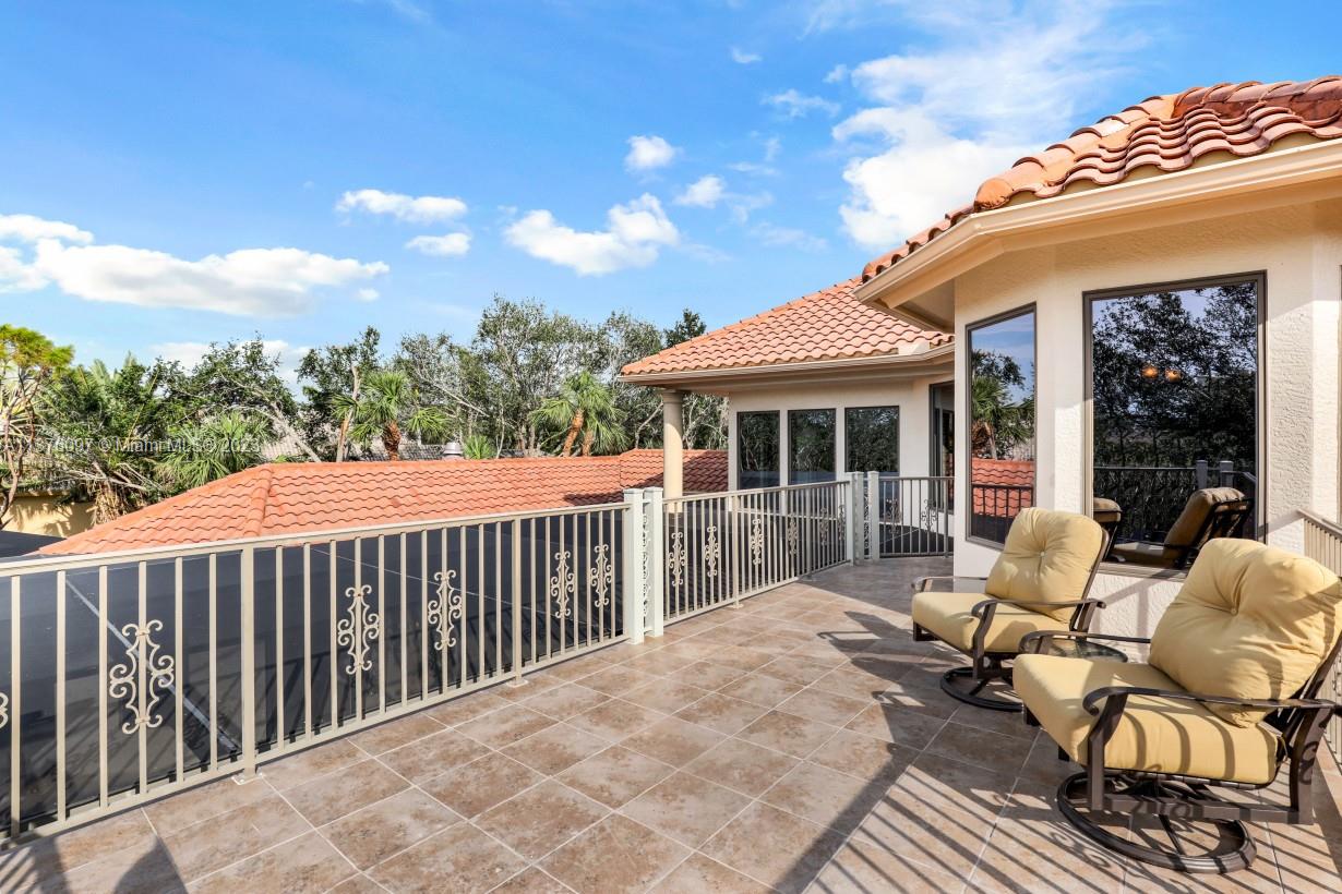 Deck area is tiled and offers private sunning