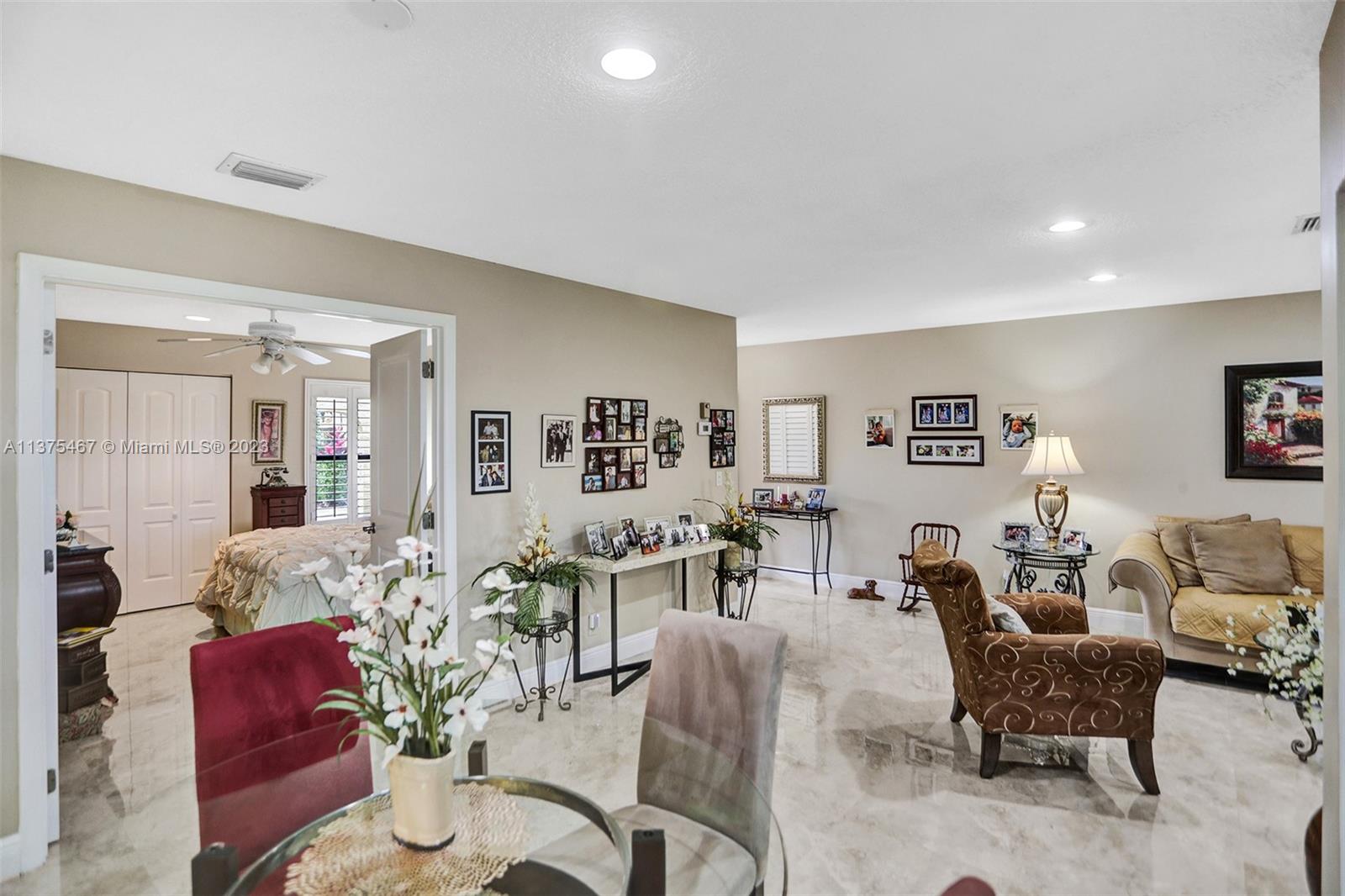 View of Dining, Living Room & Bedroom 2 which can be used as a Den or Office