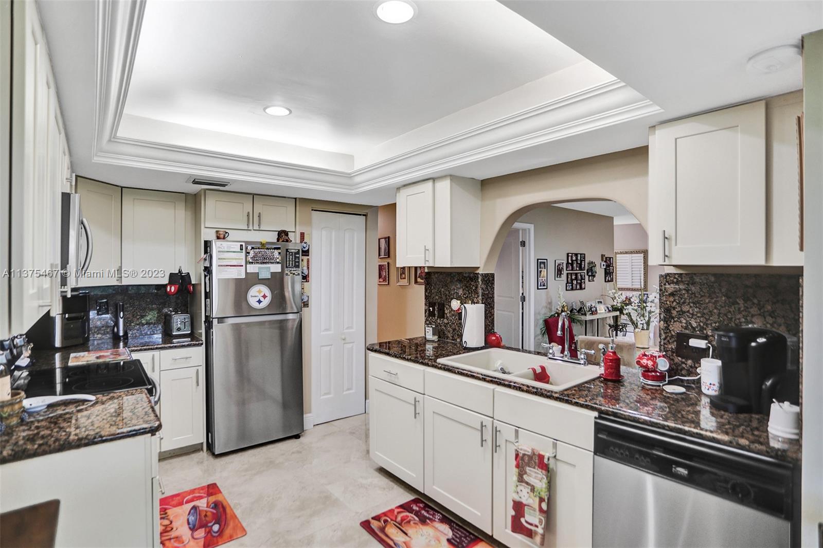 Spacious Kitchen Features Overpass Window to Dining Area