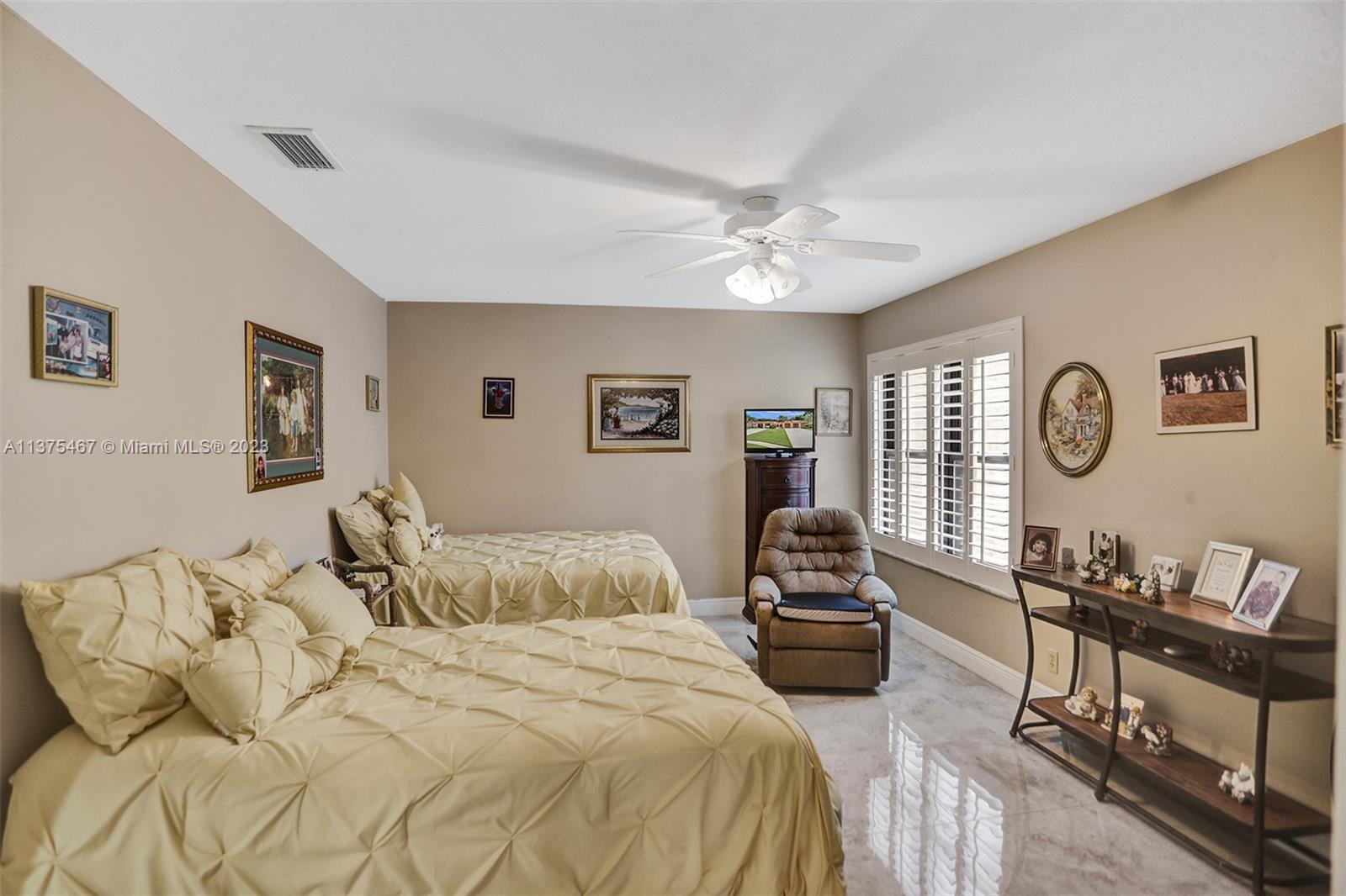 Large & Spacious Master Bedroom Features Plantation Shutter