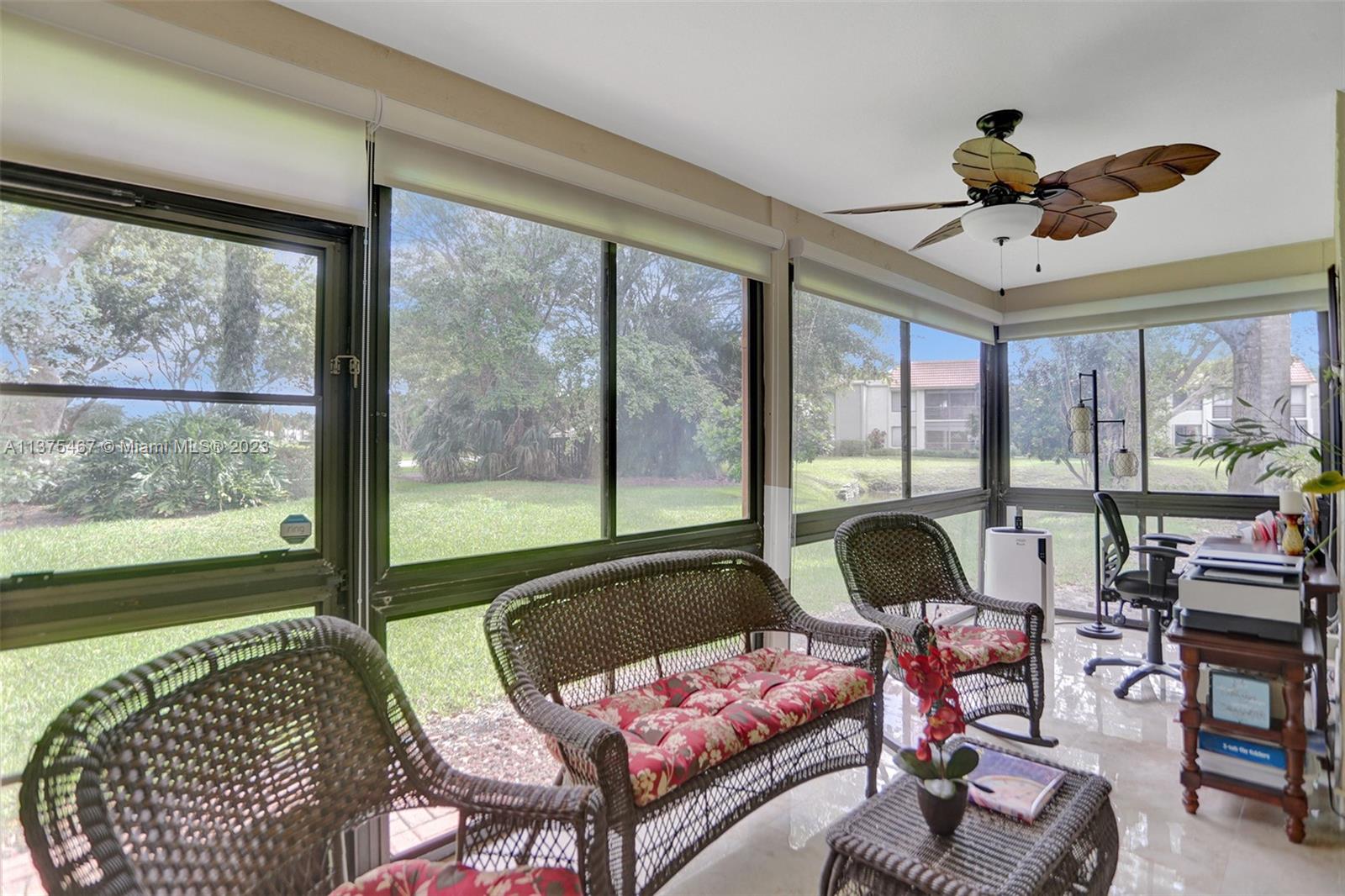 Enclosed Patio Features Spectacular Green Life View