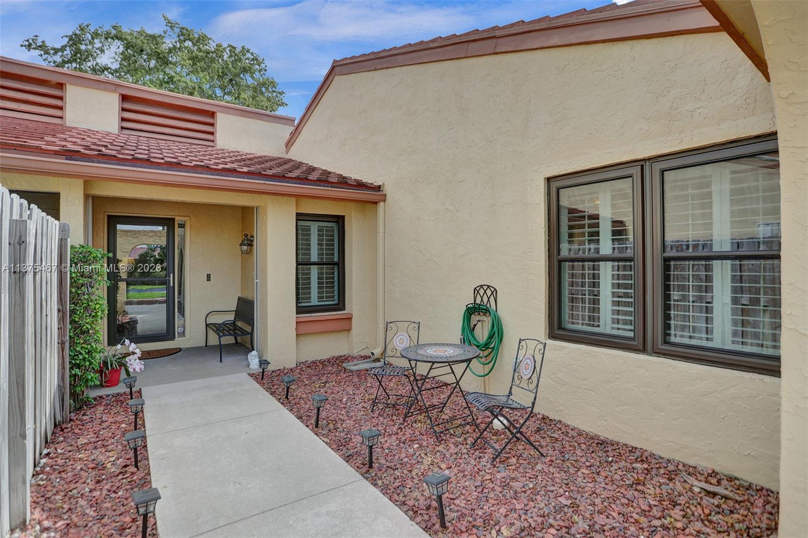 Front of Villa Features Open Front Porch