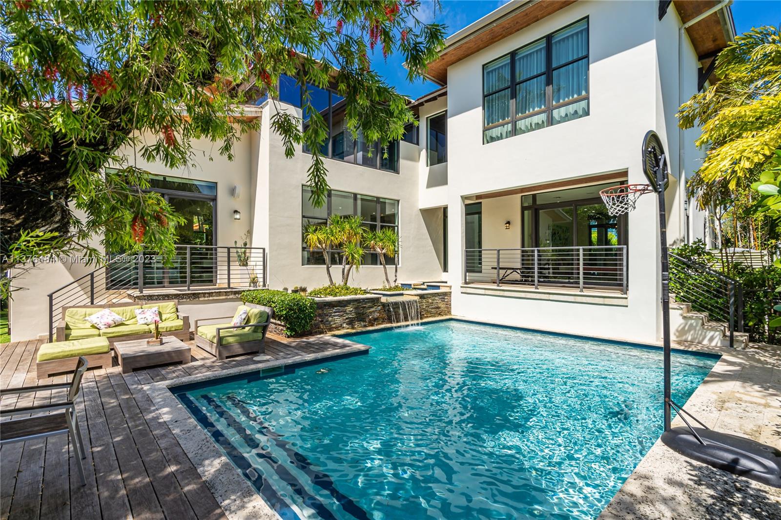 Own a piece of paradise in this three-level open design immaculate 5 bedroom plus studio, 5.5 bathroom for sale on the Prestigious Island of Key Biscayne. This perfect family home for entertaining has it all! Featuring top of the line finishes, extra high ceilings, speakers throughout with SONOS, Terrazzo flooring, oversized bedrooms en-suite with custom closets, spacious social areas, high-impact windows and doors throughout, built-in BBQ, NEST A/C and cameras, Ring doorbell and terraces overlooking the lush garden with pool and waterfall. Walking distance to schools, parks, community center, shops, restaurants and the beach! The Island of Key Biscayne is 15 minutes from Downtown/Brickell area, Coconut Grove and Coral Gables, 25 minutes from Miami International Airport and South Beach.