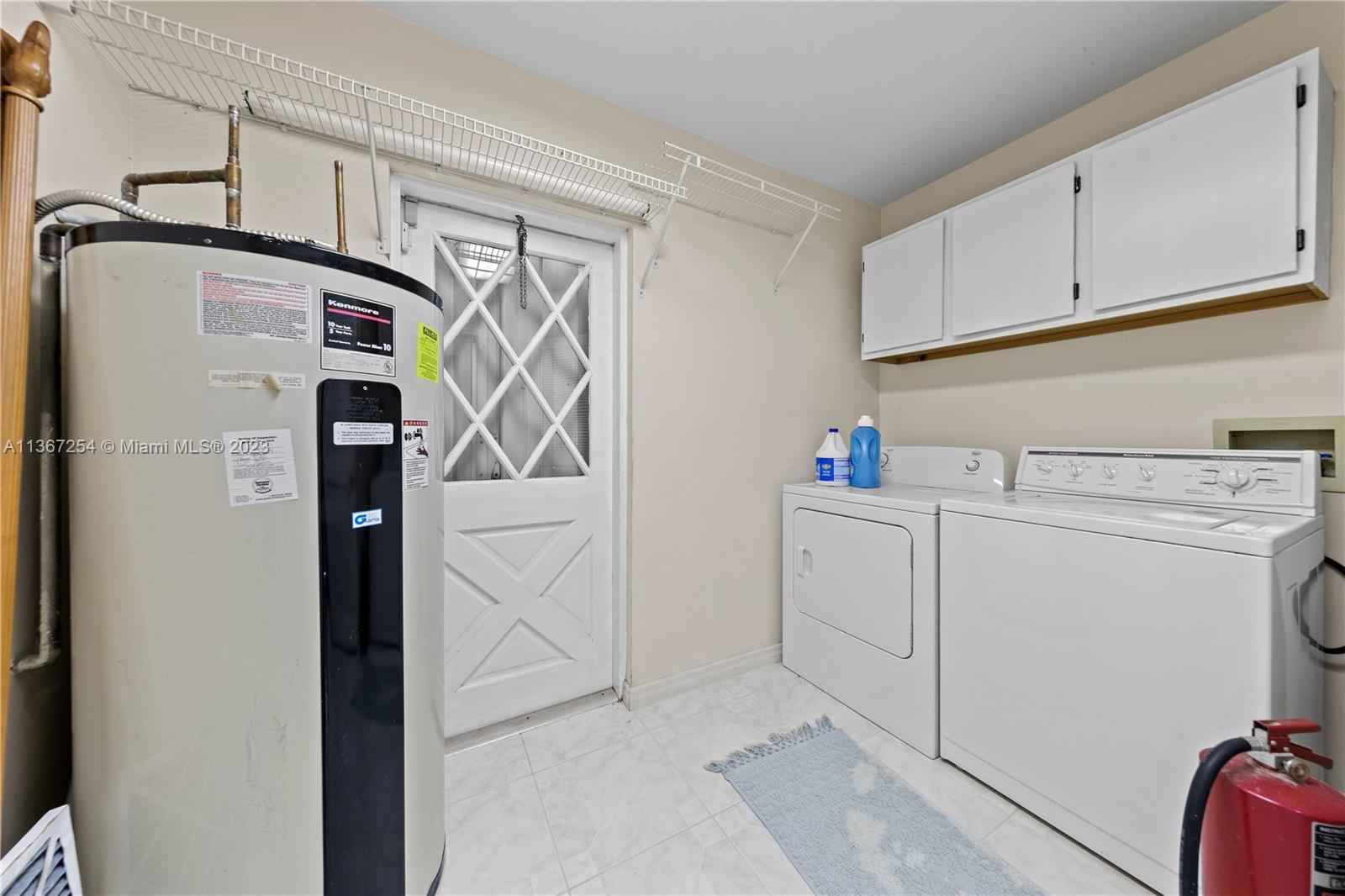 LAUNDRY/MUD ROOM, OPENS TO POOL AREA