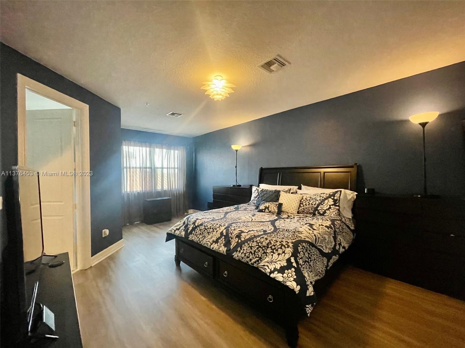 Master Bedroom with Dual Walk-In Closets