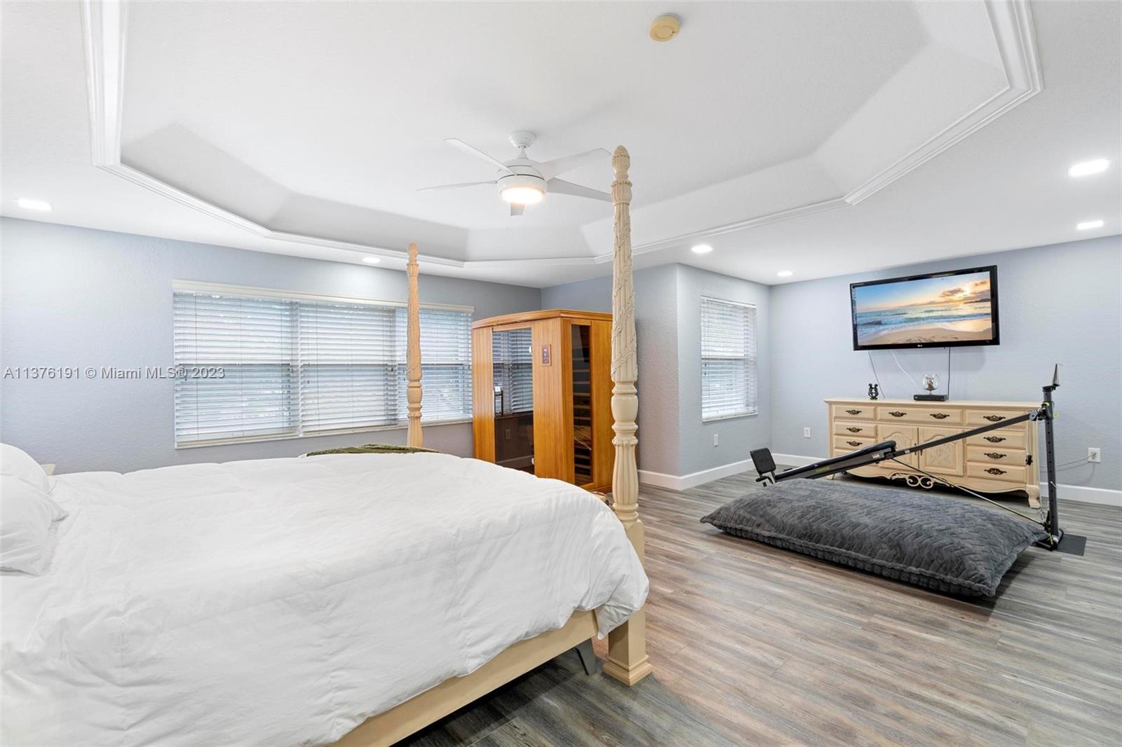 Master suite offers a prsonal sauna, lighted tray ceiling, and lounging area