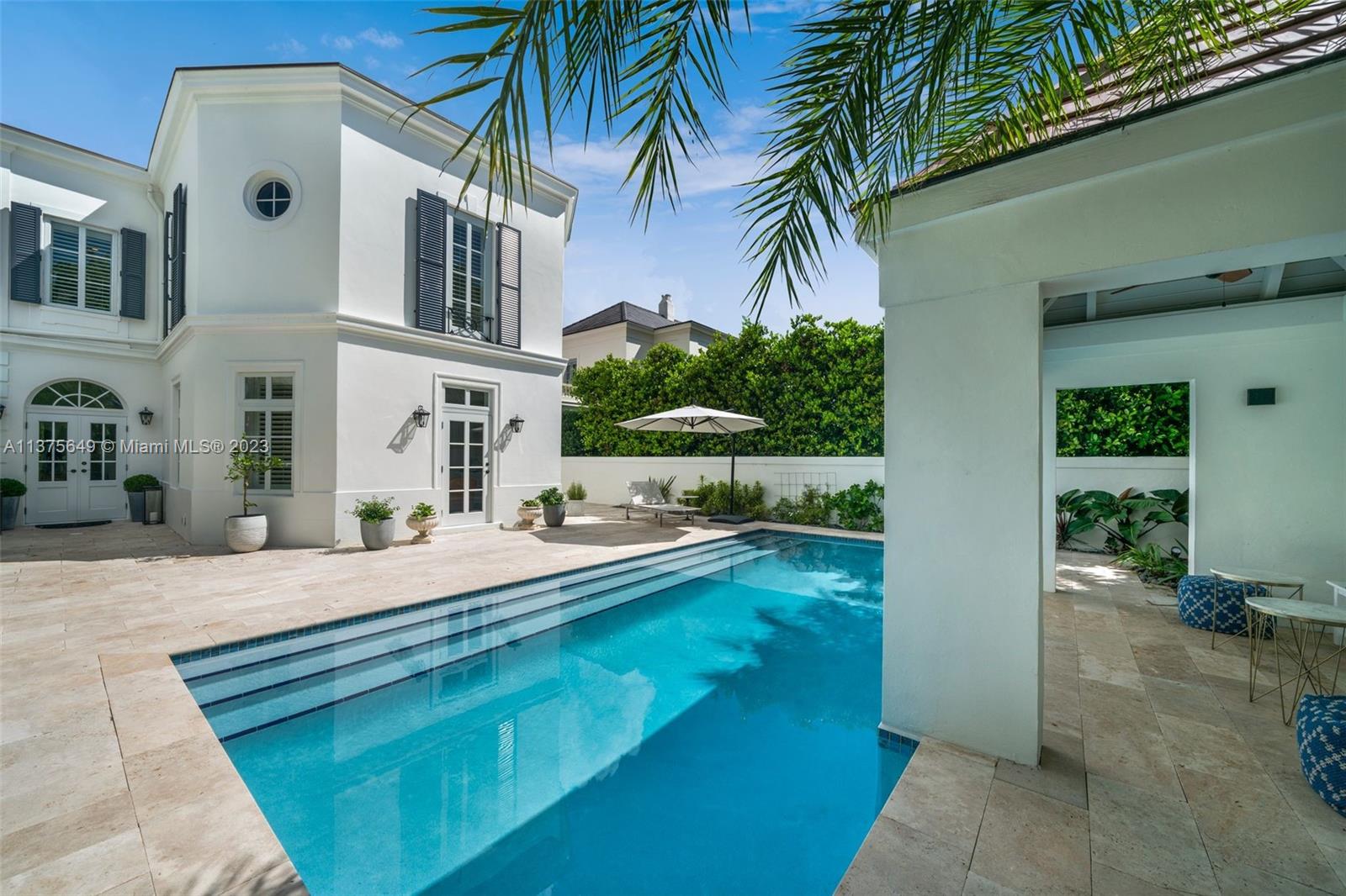 Enchanting, completely remodeled home in the beautiful French Village area of Coral Gables, with 5 bedrooms, 4.5 bathrooms and 4,074 Sq. Ft. of extraordinary living space, including a third-floor studio and playroom. Details in the living and dining rooms have been carefully chosen to reflect elegance, and European Oak wood floors and a wood-burning fireplace add style and warmth. French doors open to an outdoor paradise with a sparkling pool and gazebo. The sleek kitchen has new Wolf and SubZero appliances, Quartz countertops and a cooking island, and borders an enclosed courtyard ideal for alfresco dining. The main suite has a modern bathroom with dual vanities, frameless shower, and walk-in closet. Elegant and timeless, and close to restaurants, shopping, and schools.