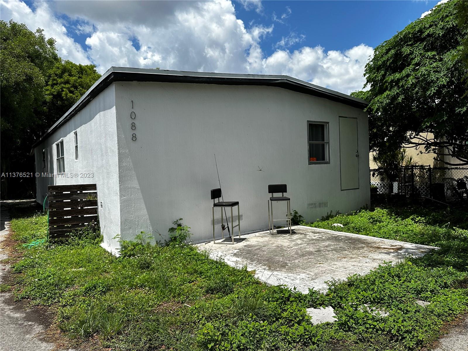 Main house, parking located to the left - entry through patio/back porch.