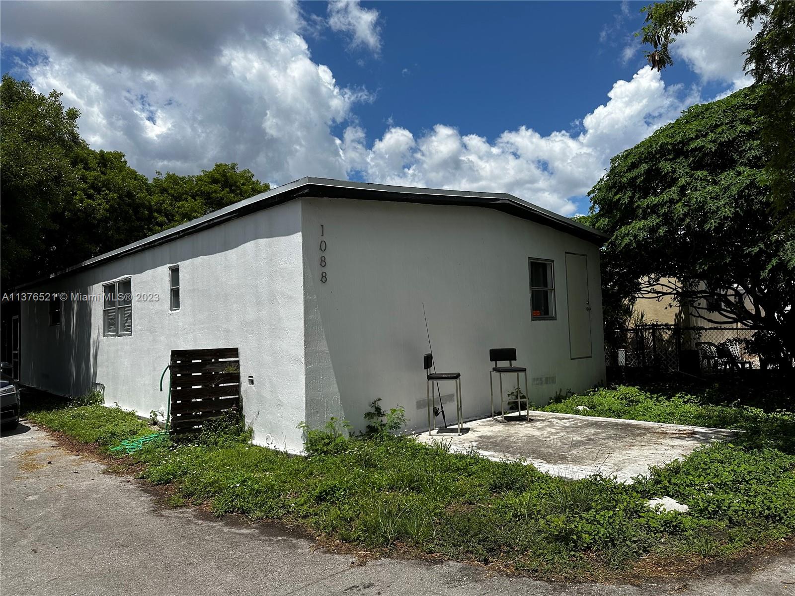 Main house, parking located to the left - entry through patio/back porch.