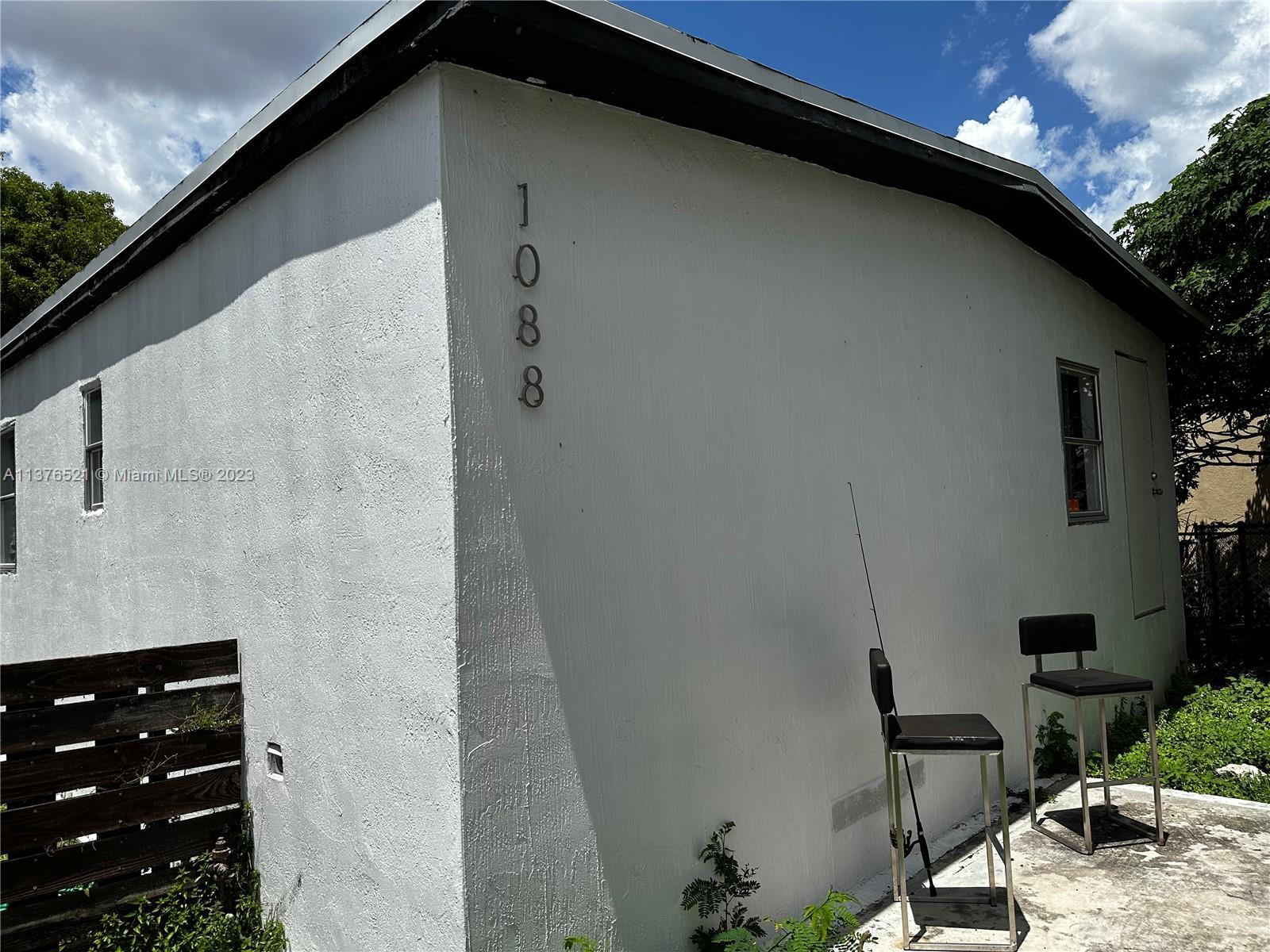 Main house, parking located to the left - entry through patio/back porch.