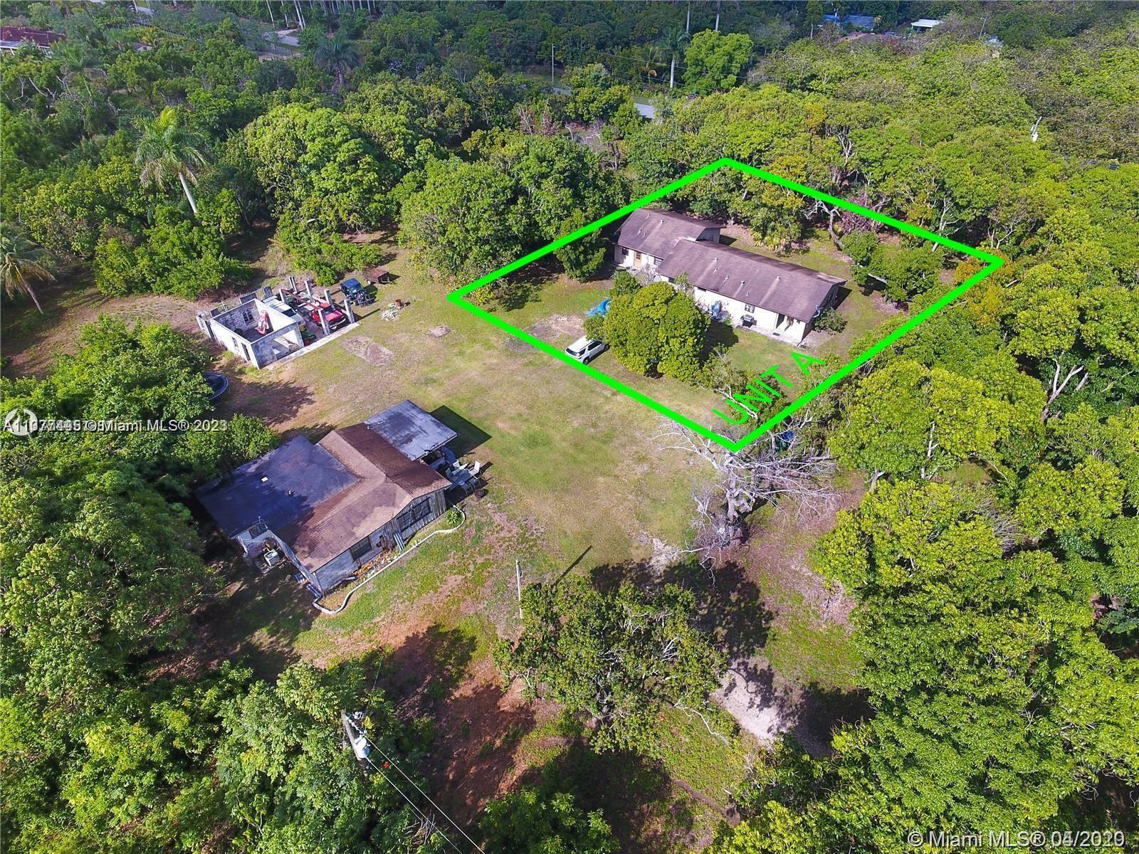 Farm living at its finest! This 4/3 home is one of two individual homes on an active, 10-acre mango and avocado grove, comfortably away from city living, and with direct access to Krome Av (Rt. 997). This home offers comfort and serenity, and is buffered by rows of trees for peaceful living with easy access to major routes into Homestead or Miami. Approximately 2300 sqft of living space includes a master with en suite bath, a second master with en suite and walk-in, two additional bedrooms with full sized closets, a laundry room, double storage rooms, and a cozy living room and kitchen with stainless steel appliances. Acreage and trees not included (see photo), and parking is shared between homes. Come see what country living has to offer - call Daniel for showings! Available June 1st.