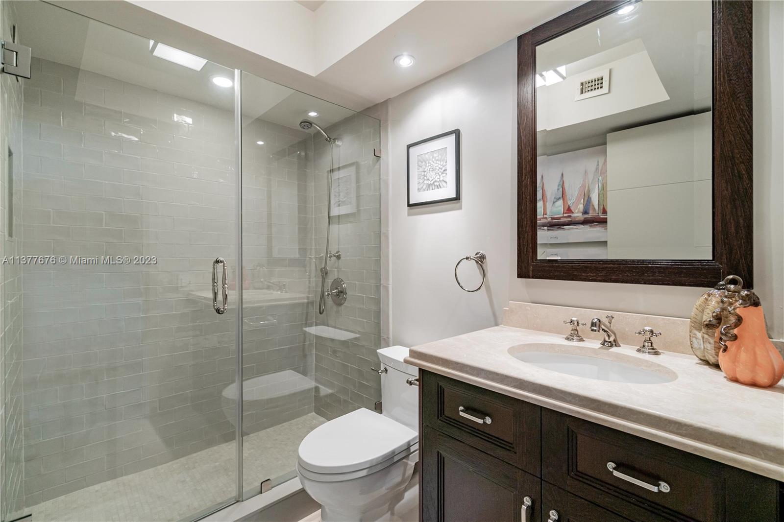 Tastefully renovated second bathroom.