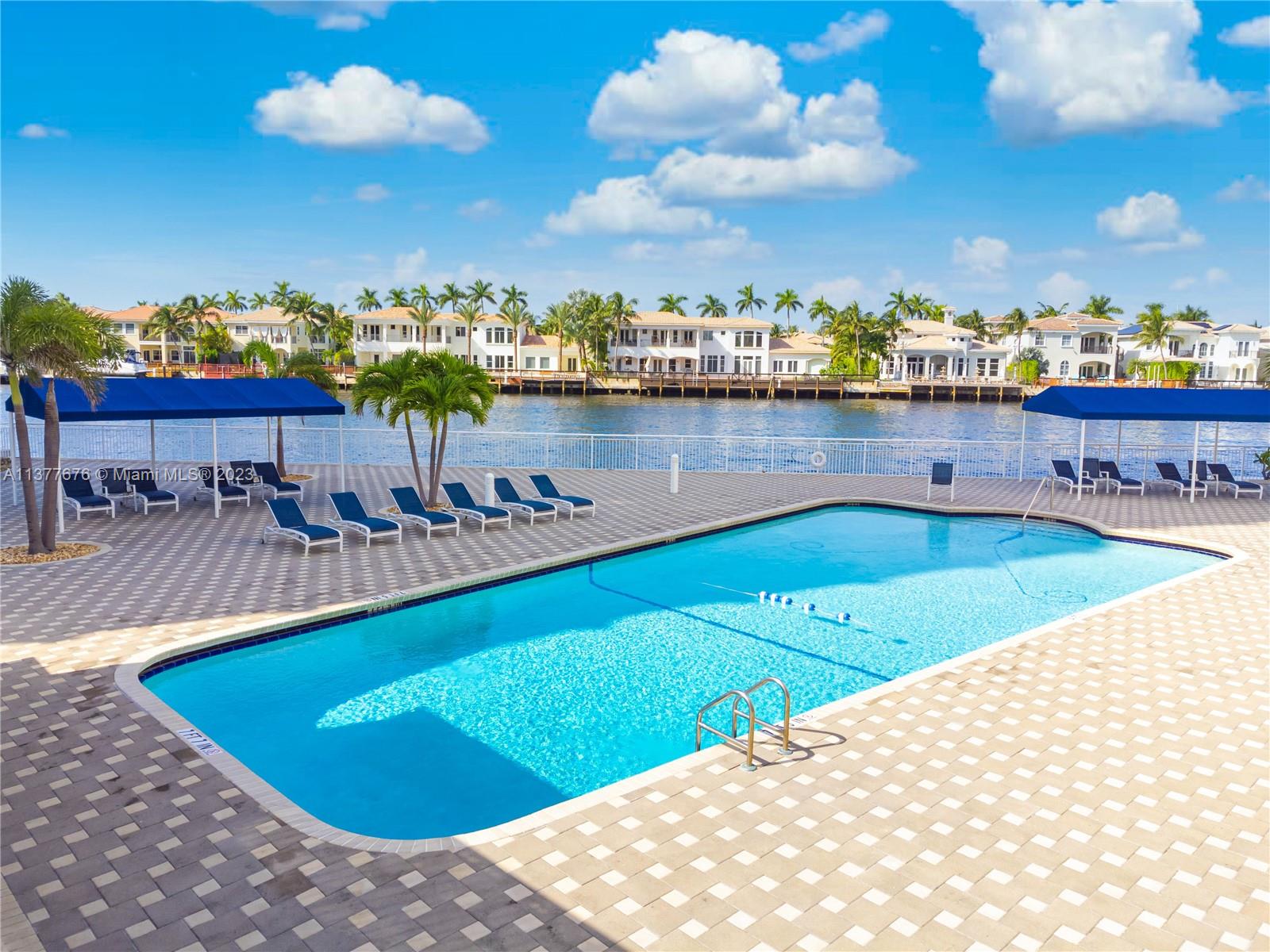 Heated Pool on the Intracoastal, to enjoy the sunrays all day long. This picture speaks Joy and Relax