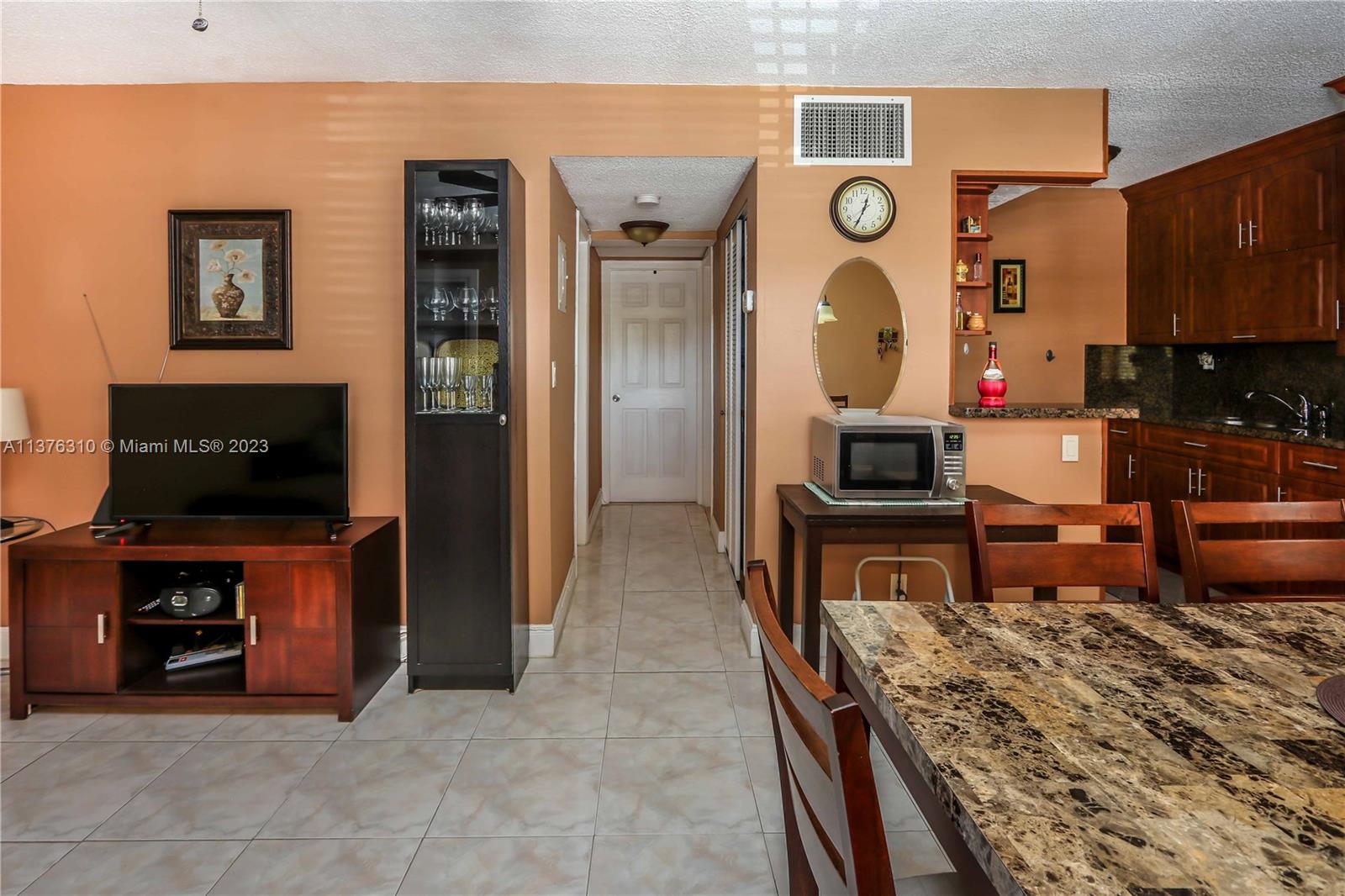 Living area includes Newer TV, cabinet & contents