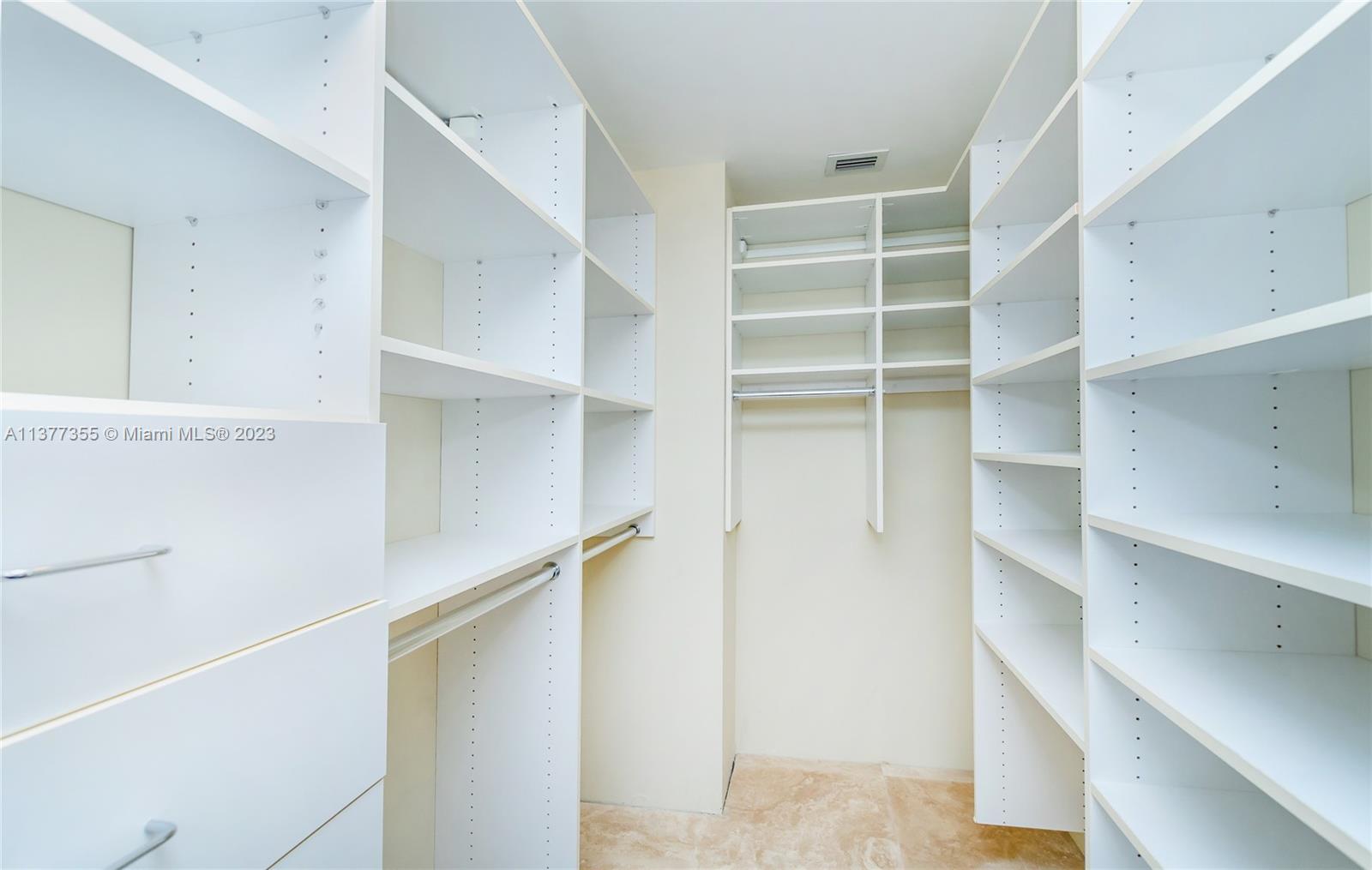 One of two principal bedroom walk-in closet