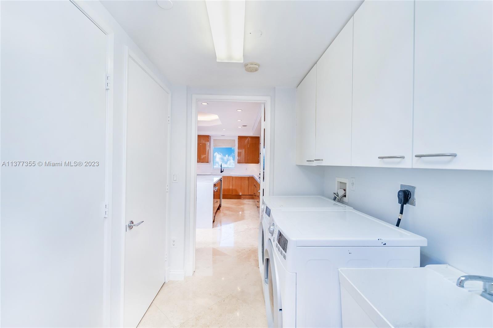 Laundry room opens to kitchen.