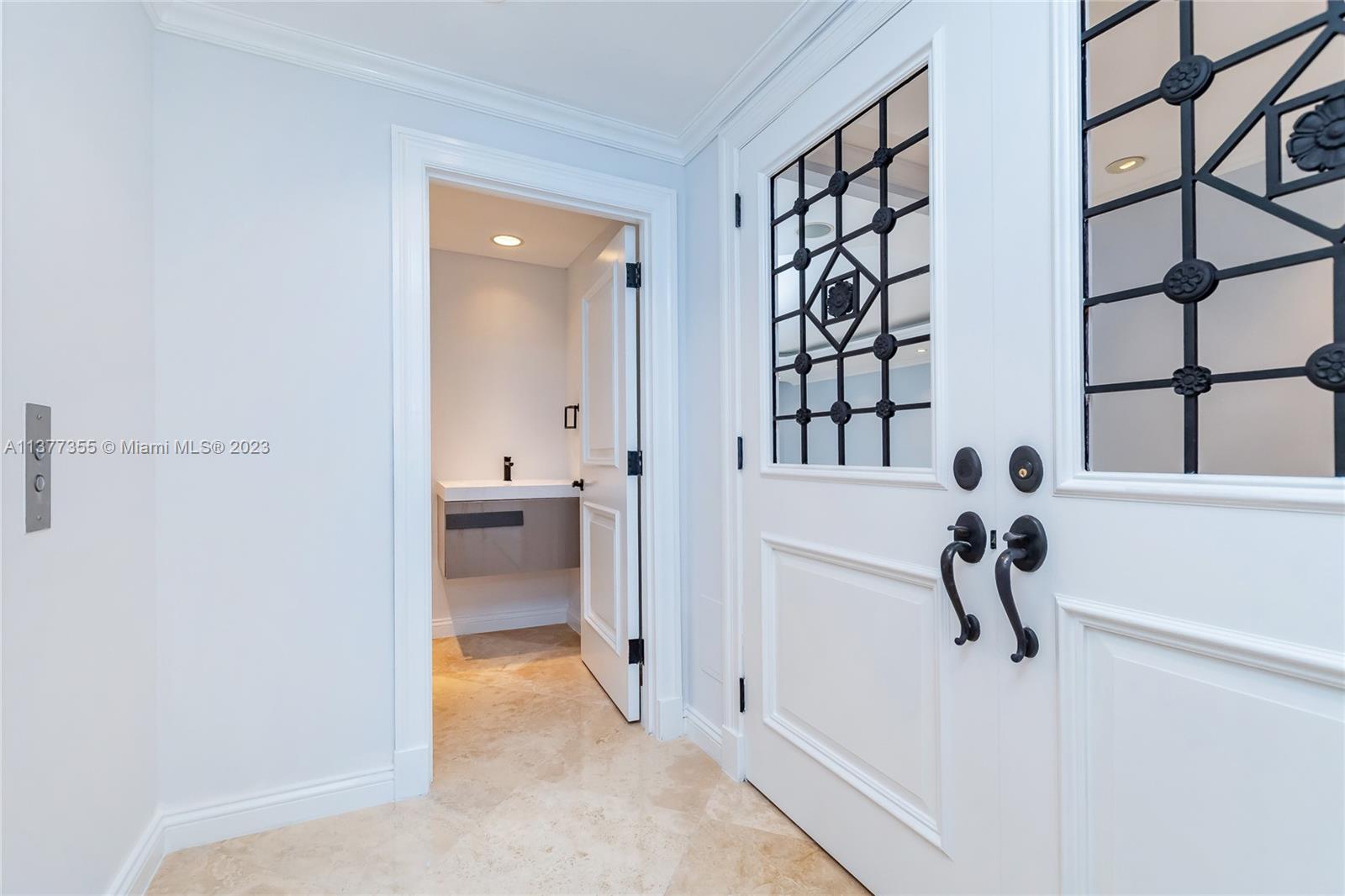 Private foyer entry with Guest Bath