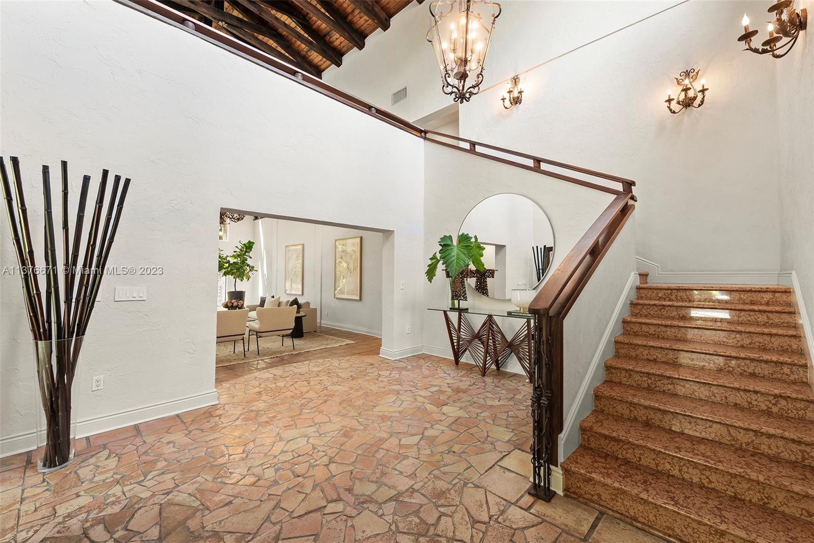 Formal Foyer With Soaring Ceilings