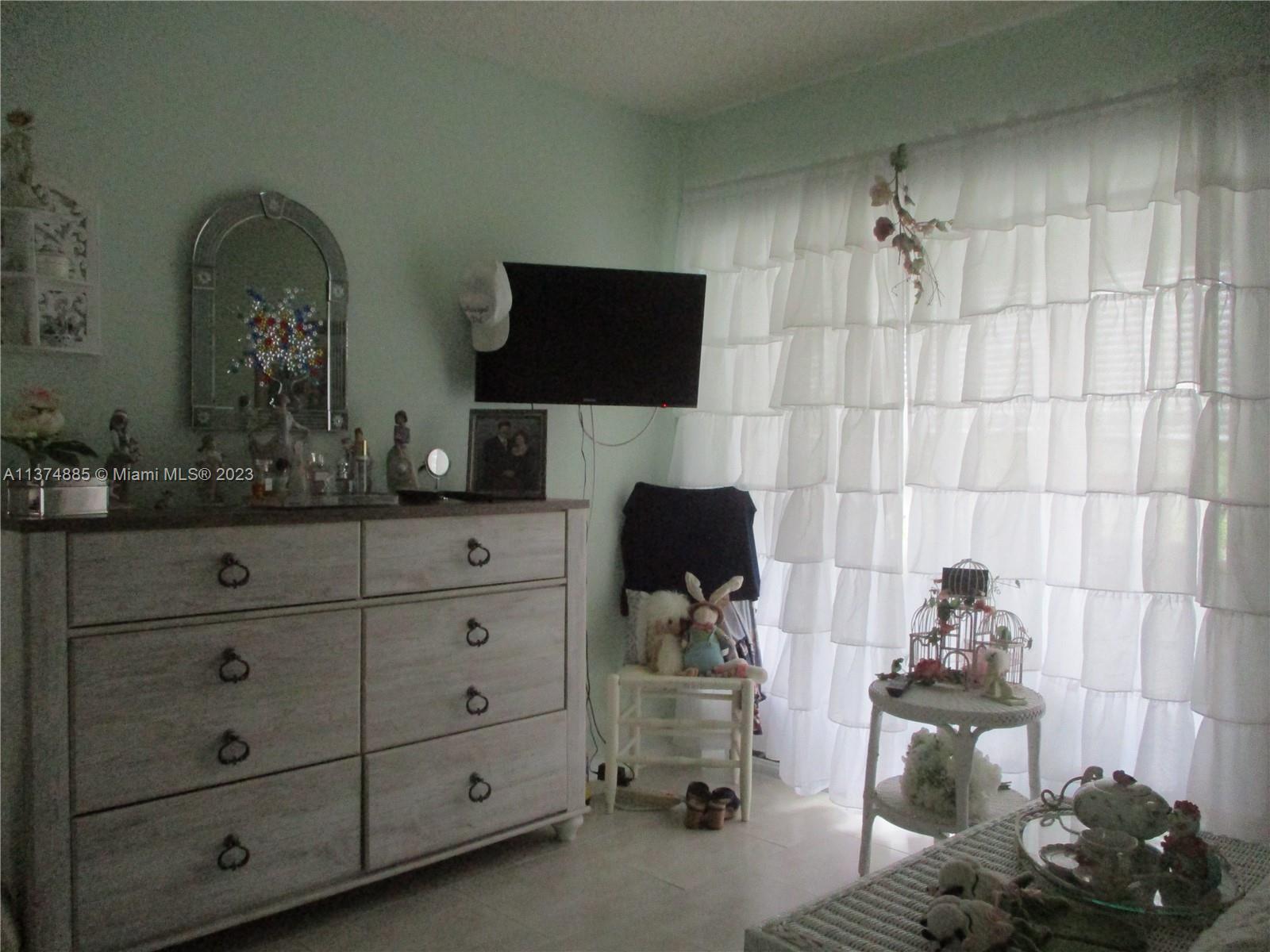 SLIDING GLASS DOOR TO PATIO FROM MASTER BEDROOM