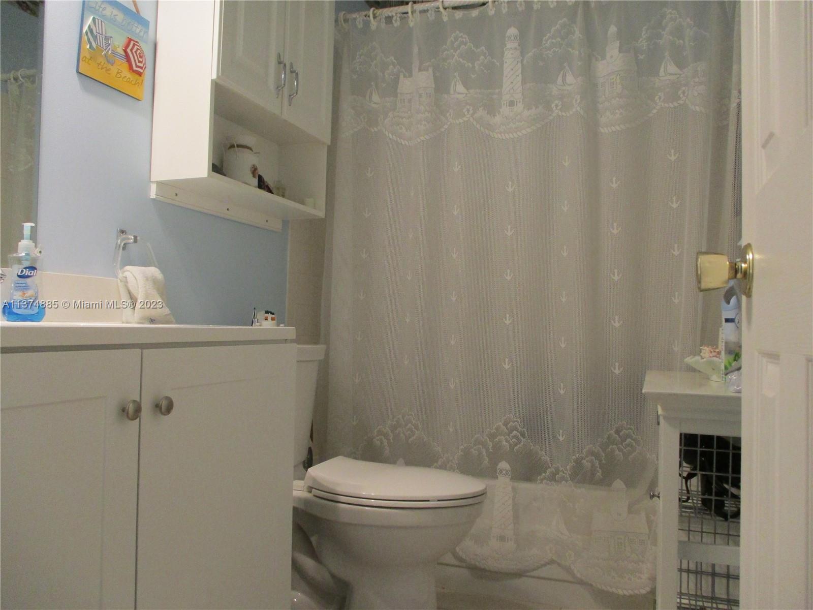 GUEST BATHROOM WITH TUB & SHOWER