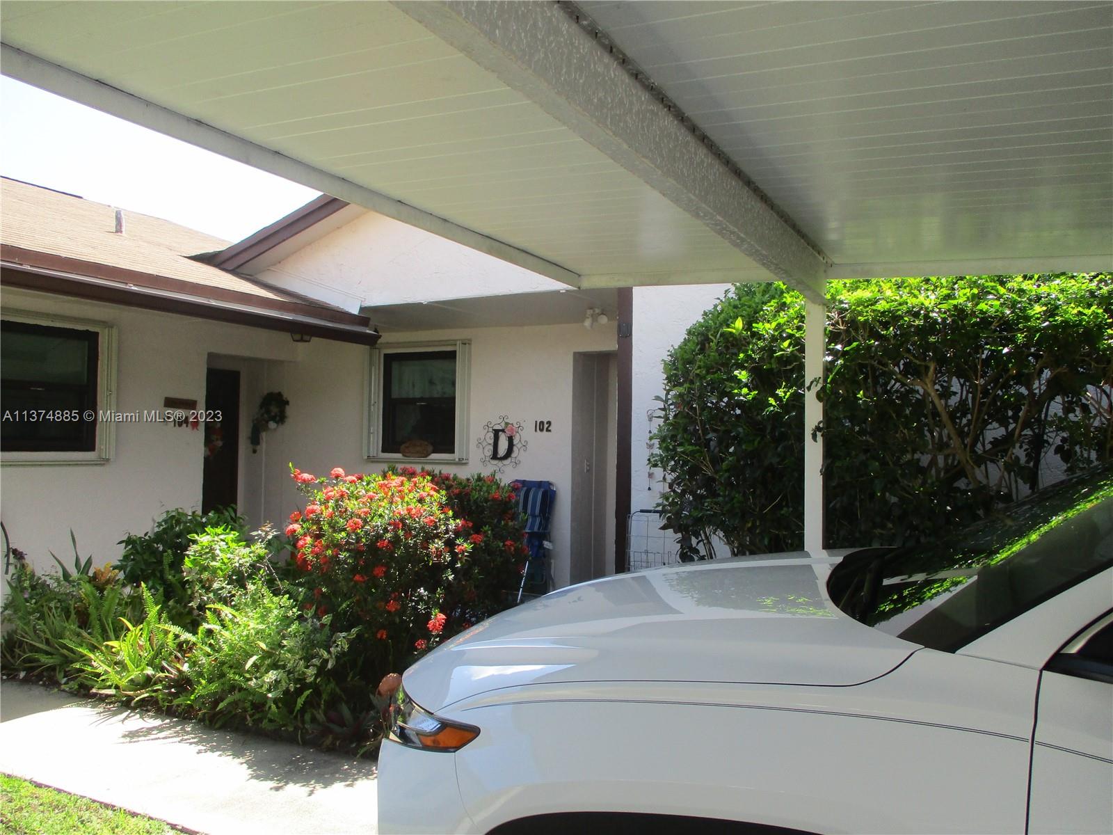 ENTRANCE INTO THE VILLA WITH YOUR CARPORT PARKING,