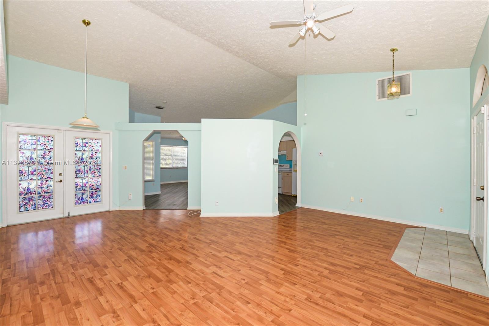 Spacious and bright Primary Bedroom with trey ceiling, full bath and walk in closet