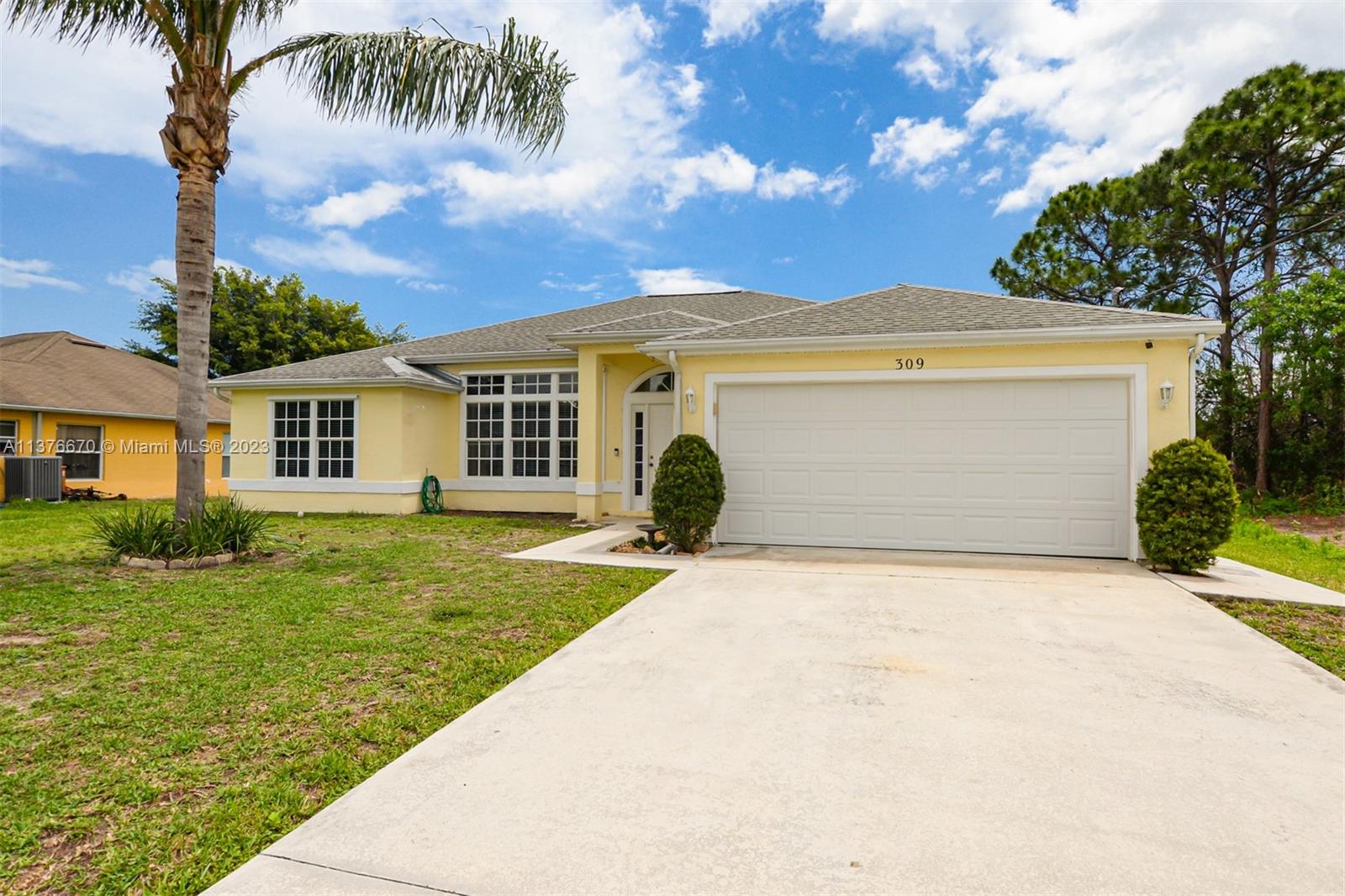 Lovely curb appeal with this 3BR/2BA pool home with fenced yard.