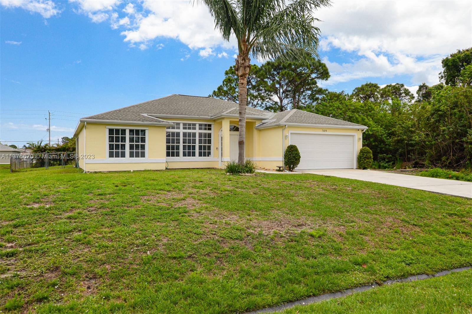 Lovely curb appeal with this 3BR/2BA pool home with fenced yard.