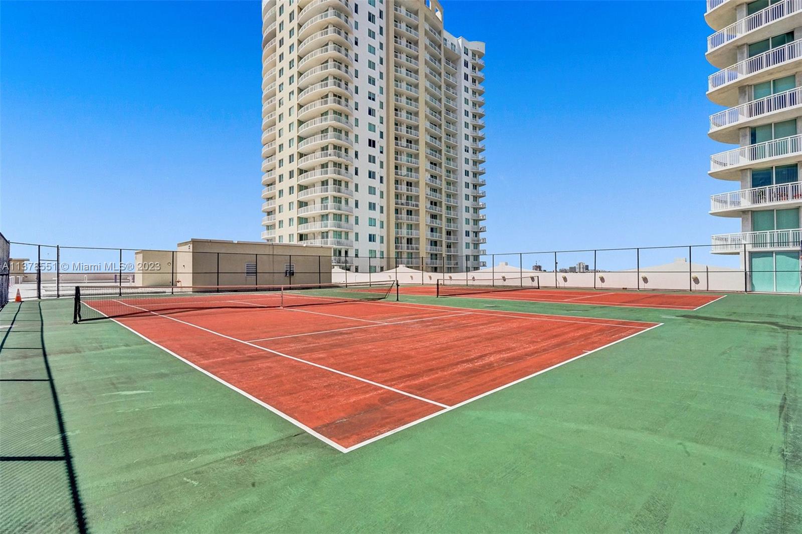 Tennis courts at the top of the parking lot