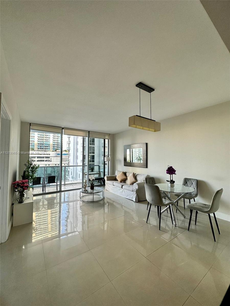 Spacious 1 bedroom apartment at 1060 Brickell Condo. Live in the heart of Brickell, close to the action and without any noise. This unit features bosh appliances, kitchen Island, washer and dryer, assigned parking space and low HOA fees. The community is well managed and includes swimming pool, hot tub, state of the art fitness center, billiard room, virtual golf room, business center...and much more!