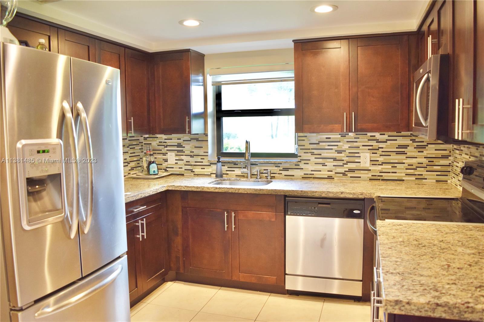 Beautiful 2/2.5 corner unit on the first floor that has been completely renovated throughout. Oversized sealed and screened patio is the perfect place to unwind and relax. Both bedrooms are ensuites plus the half bath is off the entrance. Master has completely finished large walk in closet plus additional closet. All impact throughout. A/C 2016. Washer & Dryer in unit. Access to patio from both the master bedroom and living room and back door to patio leads right to the Golf Course. Building three has access to the private pool and tennis courts. Bike parking located in residents parking lot.  Plenty of guest parking. 

Bonaventure Town Center  features resort style amenities including the oversized lap pool, bowling alley, roller skating rink, and full sized gym.