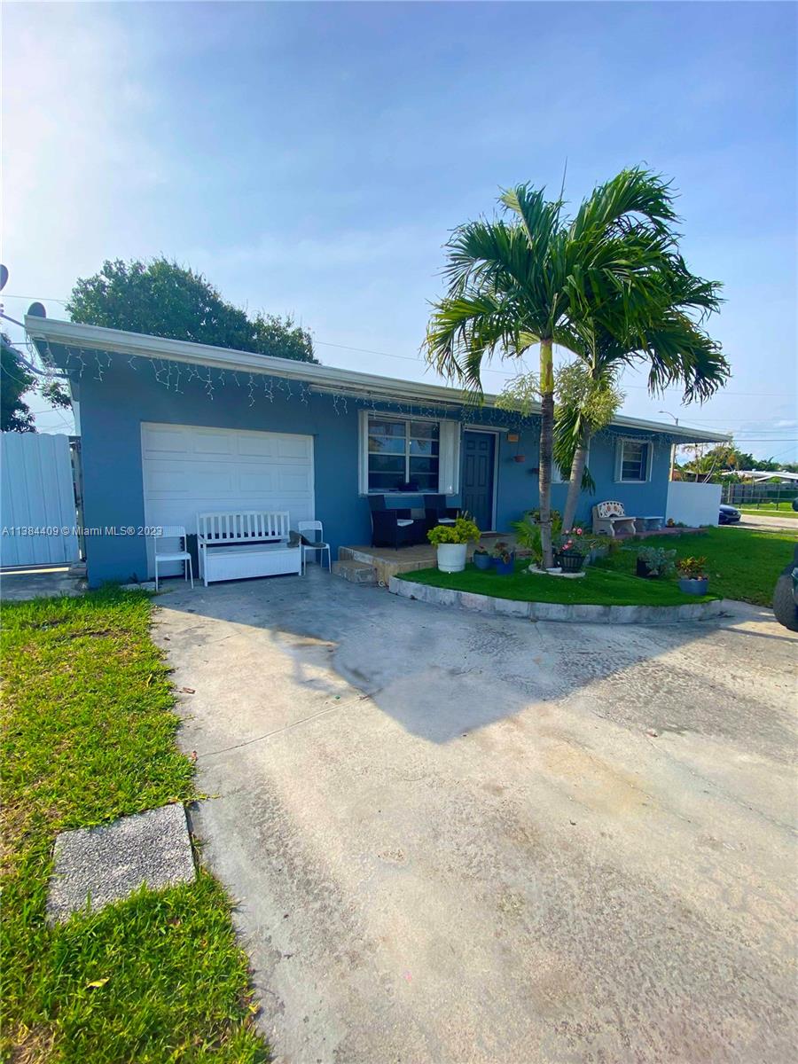 This single family home sits on a large fenced in corner lot directly off the highway. Located in a nice area and a short drive to the nearest shopping centers.  This home has a unique layout with 3 bedrooms in the front of the house, and 2 on-suites with a communal kitchen; each with their own entrance. Offers plenty of parking and back patio. Needs TLC. Great potential