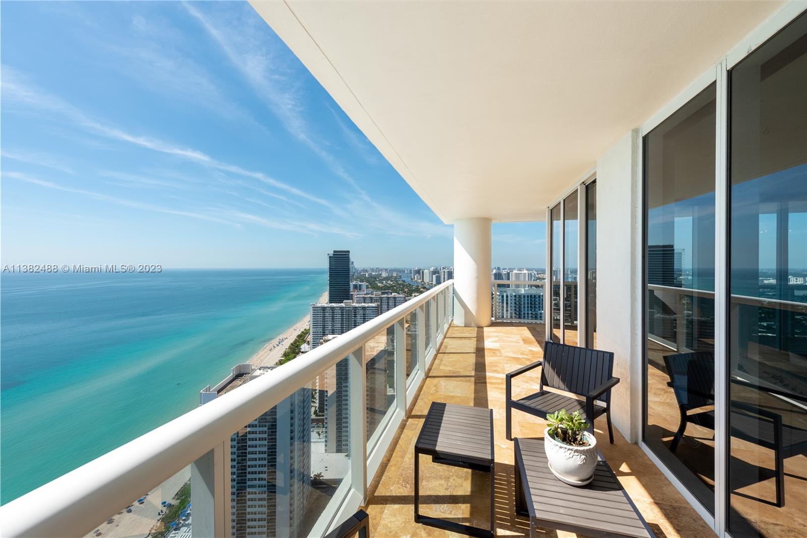 Stunning corner unit located right in front of the ocean, offering a panoramic view of the sea and the city. Consists of three bedrooms, three and a half bathrooms, and an open-concept living space,  abundance of natural light, floor-to-ceiling windows. You'll love the spacious and modern design, perfect for entertaining guests or relaxing with family. 
Located in a prime location, this property is just steps away from some of the best restaurants and shopping centers in the area. Whether you're looking for a night out on the town or a relaxing day by the beach, this unit has it all.
Don't miss out on the opportunity to live in this luxurious and exclusive building, with amenities such as a swimming pool, fitness center, and 24-hour security. Contact me today to schedule a viewing.