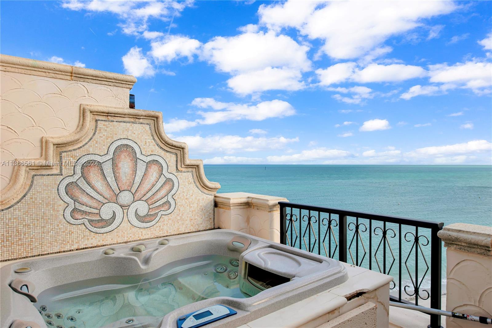 Discover the epitome of luxury Fisher Island living in our Oceanside Penthouse. This remarkable residence offers an impressive 4932 sq. ft. of living space, featuring five bedrooms and 5 1/2 bathrooms. Step onto the wraparound terrace to be greeted by breathtaking direct ocean views. Inside, you'll find quality custom built-ins, high ceilings, and Lutein lighting, creating an ambiance of sophistication. The wood floors in all bedrooms, each equipped with en-suite baths, add a touch of elegance. Indulge your culinary desires in the top-of-the-line Chef's kitchen, boasting premium finishes and fixtures. With sprawling entertainment spaces, this penthouse is perfect for creating lasting memories with your loved ones. Embrace the true essence of family unity in this unparalleled residence.