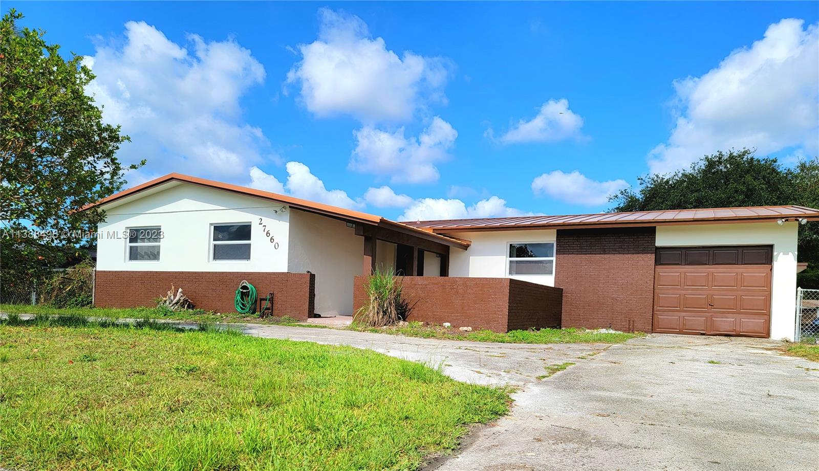Suburban living at it's best! This 4 bedroom 2 bathroom home has been freshly painted inside and out. Foyer entry with a storage closet leads you into the living room with french doors giving you access to the backyard. Inside you will find tile flooring all throughout, great sized kitchen and newly remodeled bathrooms. Shared washer/dryer available in garage. Whole house water softener system provided. Peace of mind with all impact windows and newer metal roof. Come and see this great home near South Dade HS and South Dade community park with easy accessibility to US1, turnpike and Krome ave.
650 minimum credit score required. Available for immediate occupancy.
*efficiency on property is currently occupied. Tenant has their own private entrance and parking*