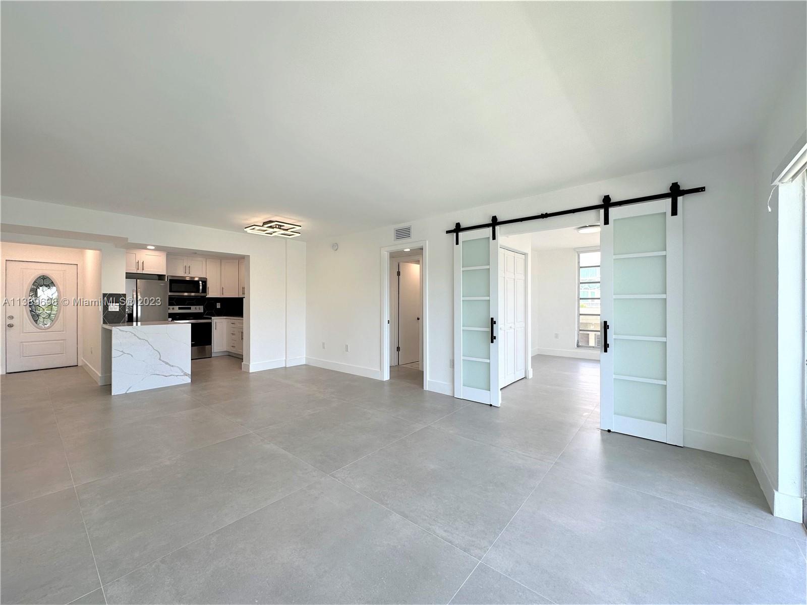 **THIS UNIT IS RENTED FOR $3950/MO THRU 9/30/24** ABSOLUTELY DELIGHTFUL 4 BED, 2 BATH WATERFRONT CONDO JUST A SHORT STROLL TO THE BEACH, SCHOOLS, THE PARK & FANTASTIC DINING & NIGHTLIFE. DIRECT WATER VIEWS FOREVER OVER THE CANAL & POOL DECK. HAVE A BOAT? BRING IT. THERE IS SPACE FOR RESIDENTS TO DOCK. TWO ASSIGNED & GATED PARKING SPACES AND INCREDIBLY LOW MAINTENANCE OF JUST $325/MONTH. THE UNIT IS A 5-STAR RENOVATION SPORTING 48X48 ITALIAN PORCELAIN FLOORING THROUGHOUT, SPARKLING QUARTZ & STAINLESS STEEL KITCHEN, NEW WASHER & DRYER IN THE UNIT, NEW CENTRAL AC, FANTASTIC BUILT-OUT CLOSETS, IMMACULATE NEW CARRERA BATHROOMS, CHIC DOUBLE BARN DOORS, PERFECT CUSTOM PAINT & LIGHTING & AN ENORMOUS BALCONY OVERLOOKING THE WATER & MIAMI BEACH NIGHTLIGHTS. THERE IS NOTHING LIKE THIS AVAILABLE EVER.