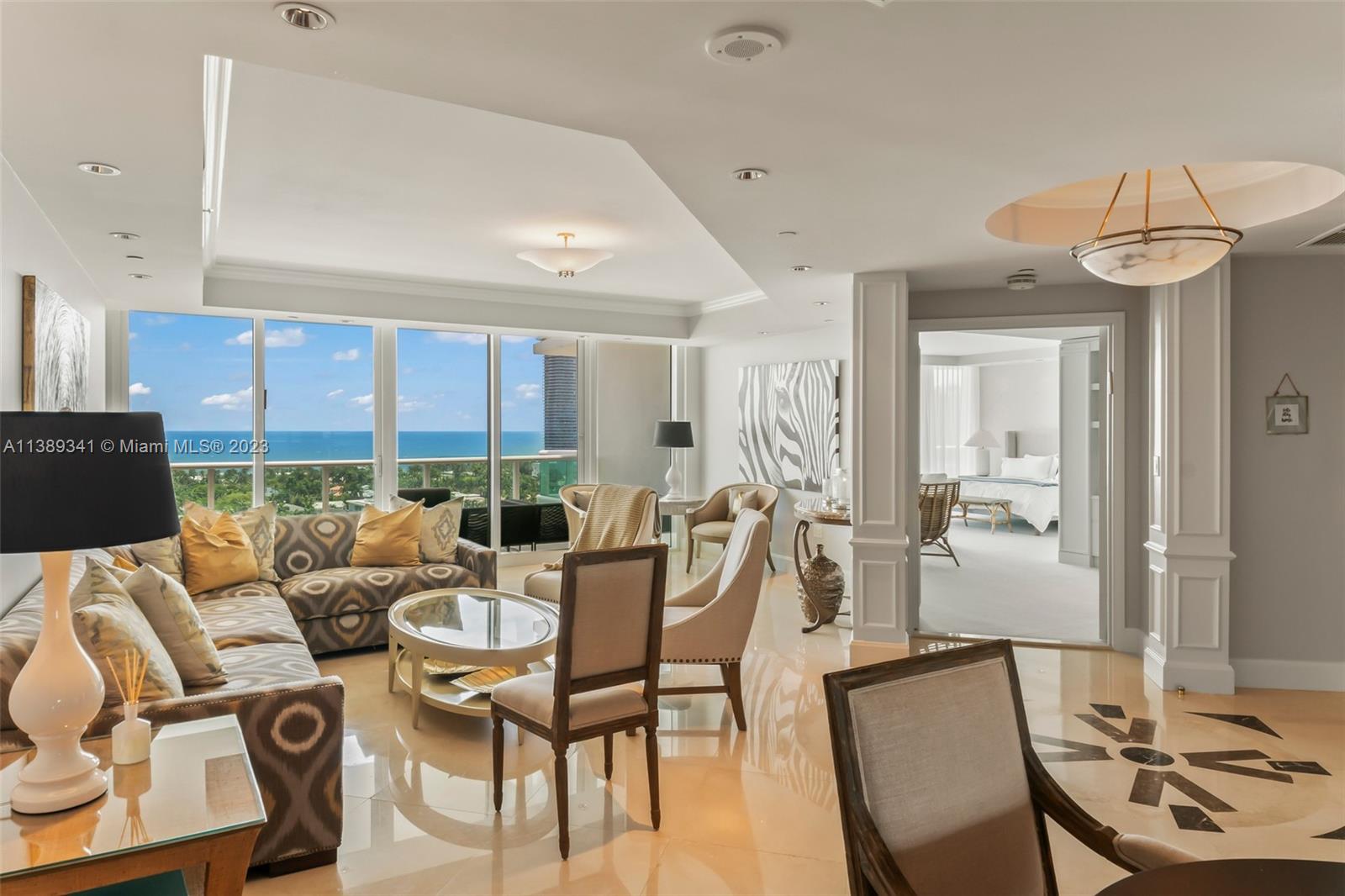 Enjoy panoramic views of the Intracoastal, Ocean, and golf course, from this spectacular flow-through 4 beds, 5 baths, + bonus room, 3300 SF residence. The apartment includes marble floors, built-ins, walk-in closets, floor-to-ceiling glass windows, 2 large balconies facing east, and an additional west-facing for exceptional sunsets over the Turnberry Resort and Club golf course. A private elevator opens into your beautiful foyer. Top-of-the-line appliances and Italian cabinets. Master suite boasts views of the ocean, walk-in closet, built-in bookcase, and his/hers bathroom. Luxurious resort-style living with tennis complex, 3 restaurants, bar/lounge, poolside service, spa, wellness, and fitness center, children's playground, basketball courts, pickleball courts, and more.